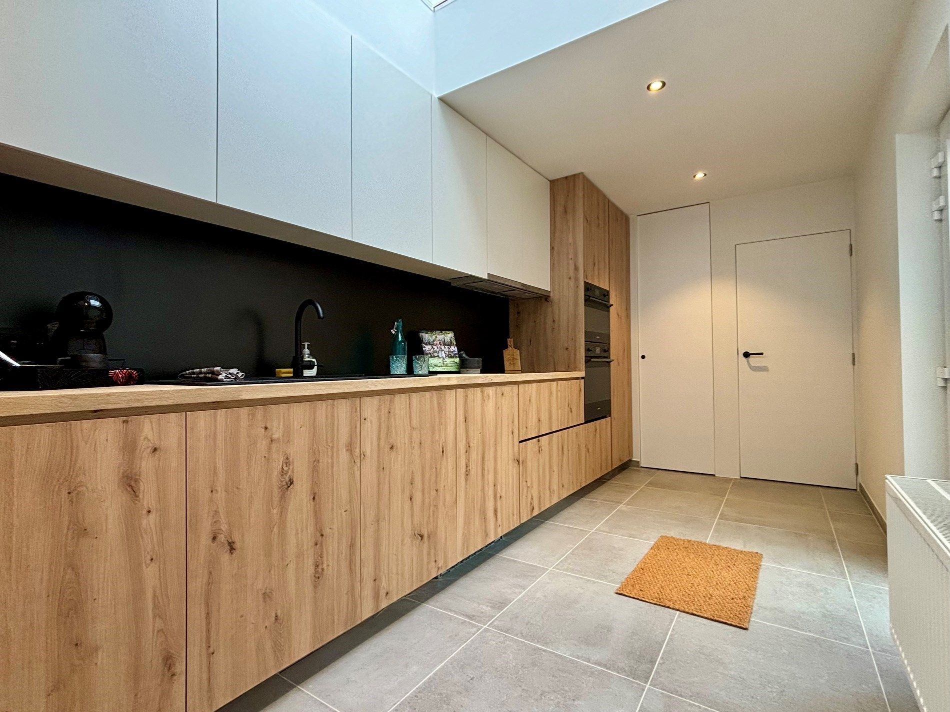 Instapklare, knap gerenoveerde rijwoning op wandelafstand van het centrum van Kuurne. foto 5