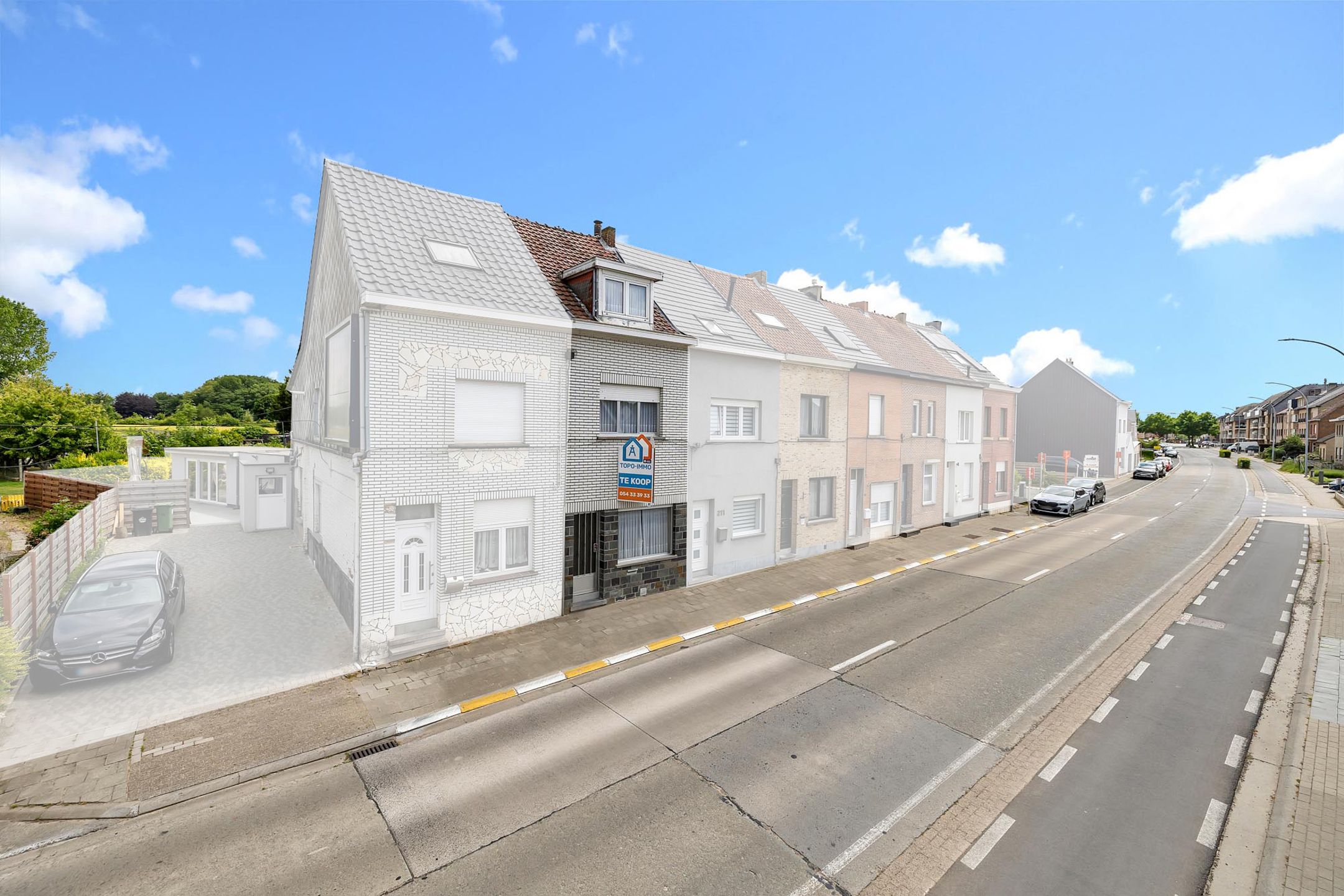 Hoofdfoto van de publicatie: Te renoveren woning met tuin en perceel met garage