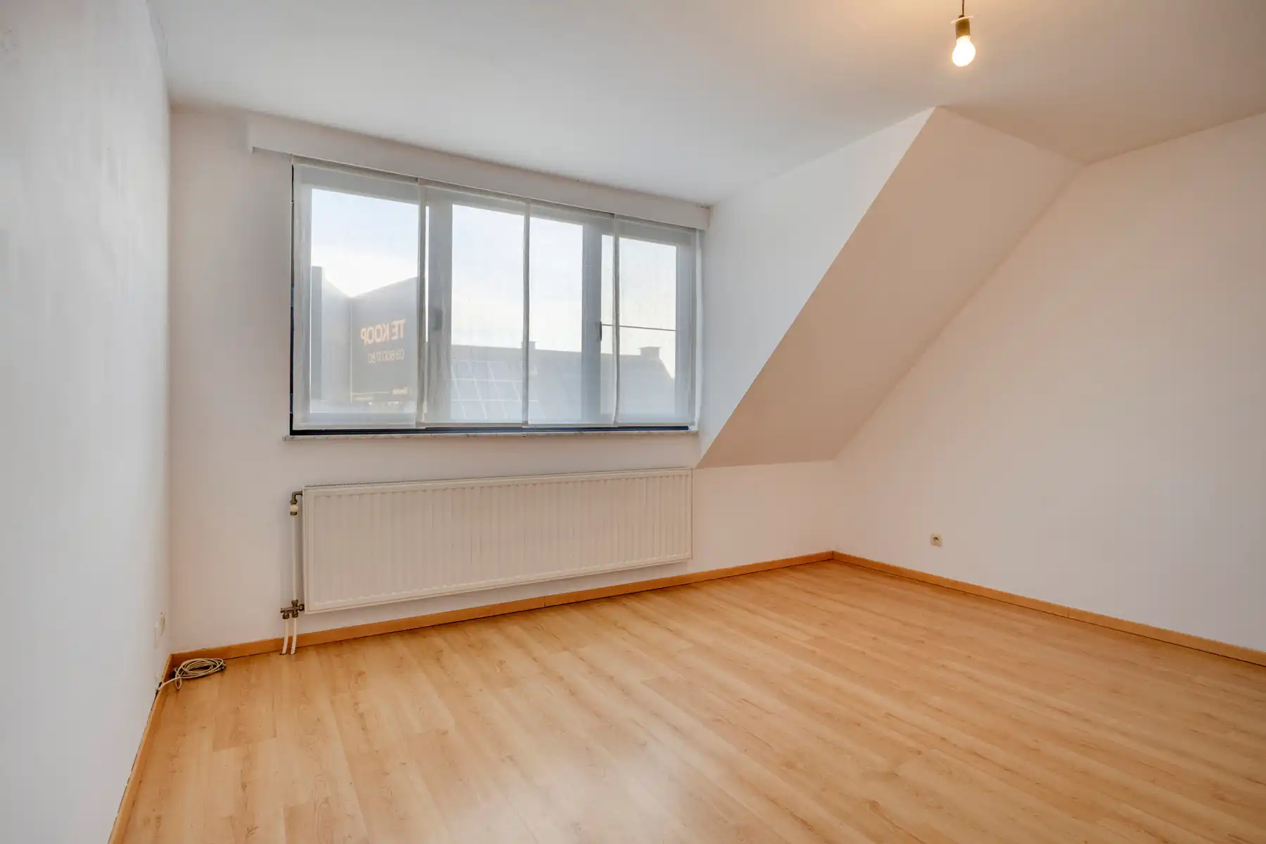 Ruim appartement met drie slaapkamers in centrum Wommelgem. foto 9