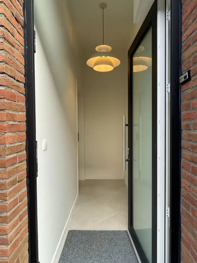 Instapklare, energiezuinige rijwoning met zonnig terras nabij Provinciedomein Kessel-Lo foto 3