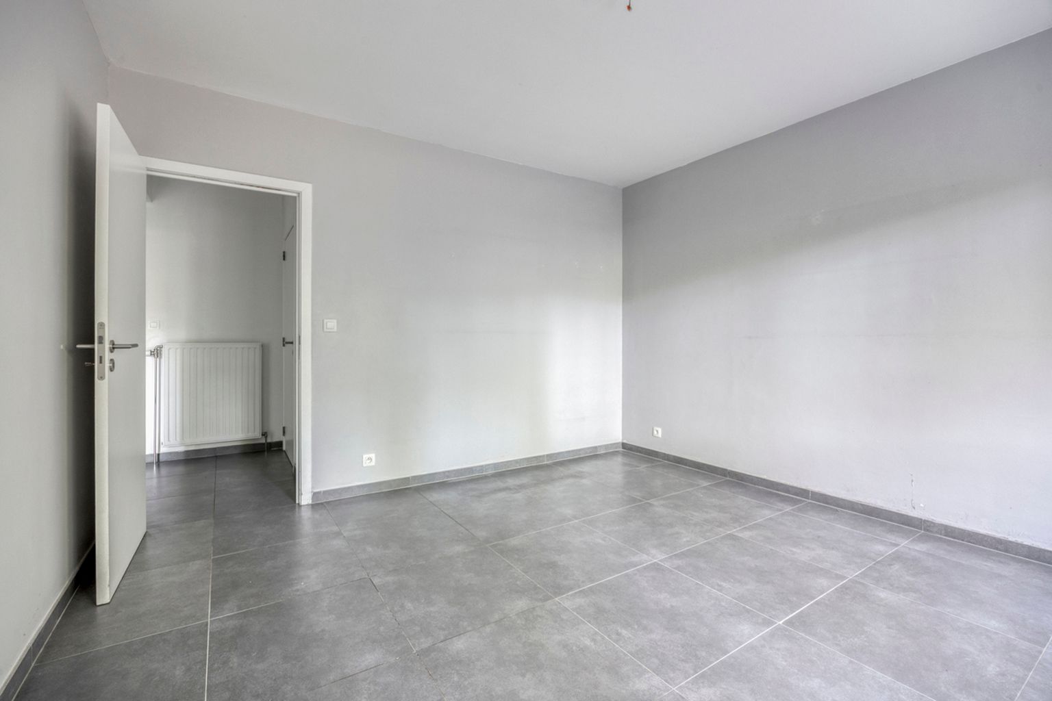 Instapklaar gelijkvloers appartement met eigen tuin foto 10