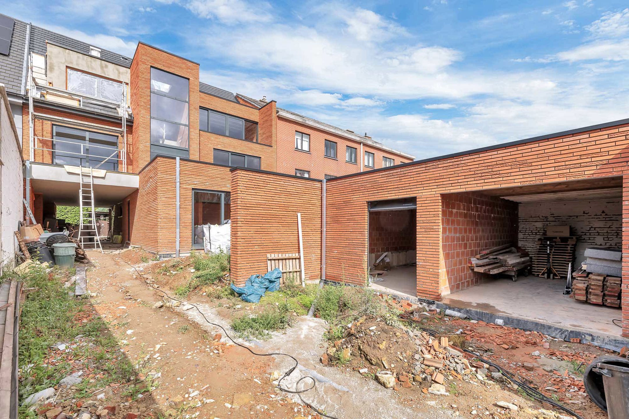 Duplex appartement met drie slaapkamers en twee badkamers foto 4