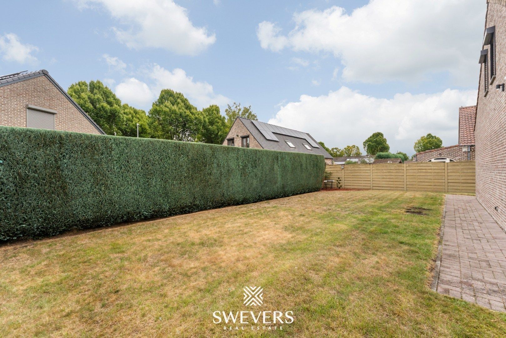 Instapklare gezinswoning met 5 slaapkamers en zonnige tuin te Genk foto 32