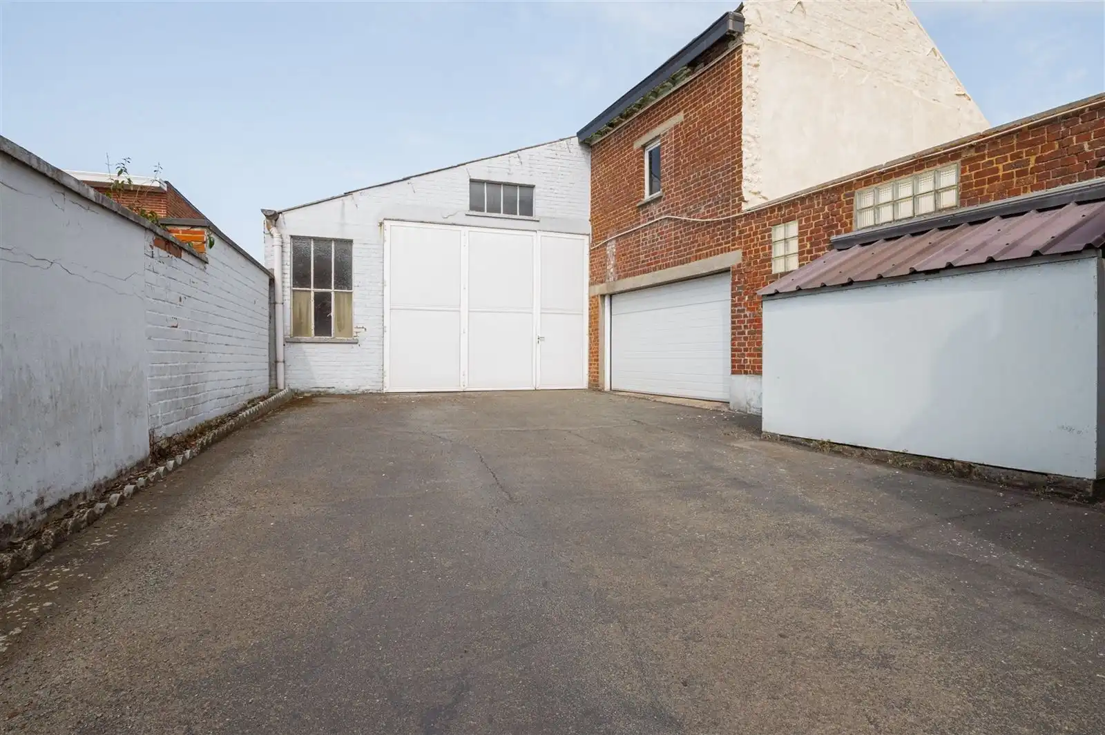 3 gevelwoning met loods (248m2) en garage foto 30