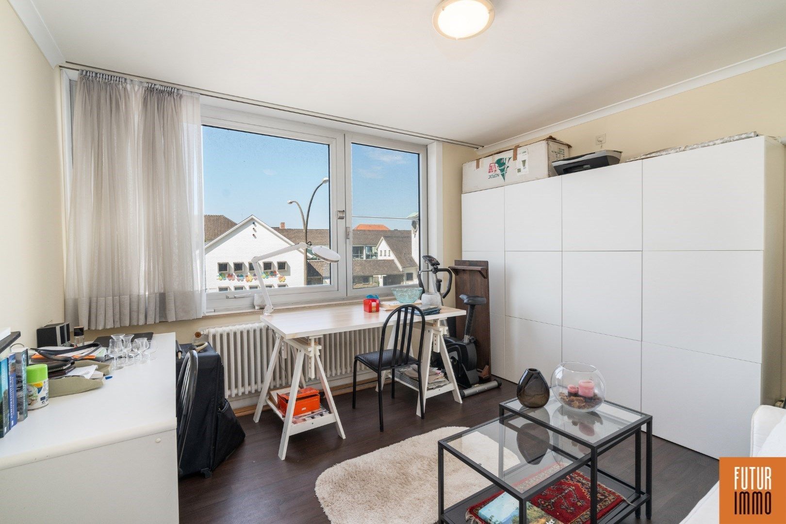 Ruim appartement met ondergrondse parkeerplaats foto 9