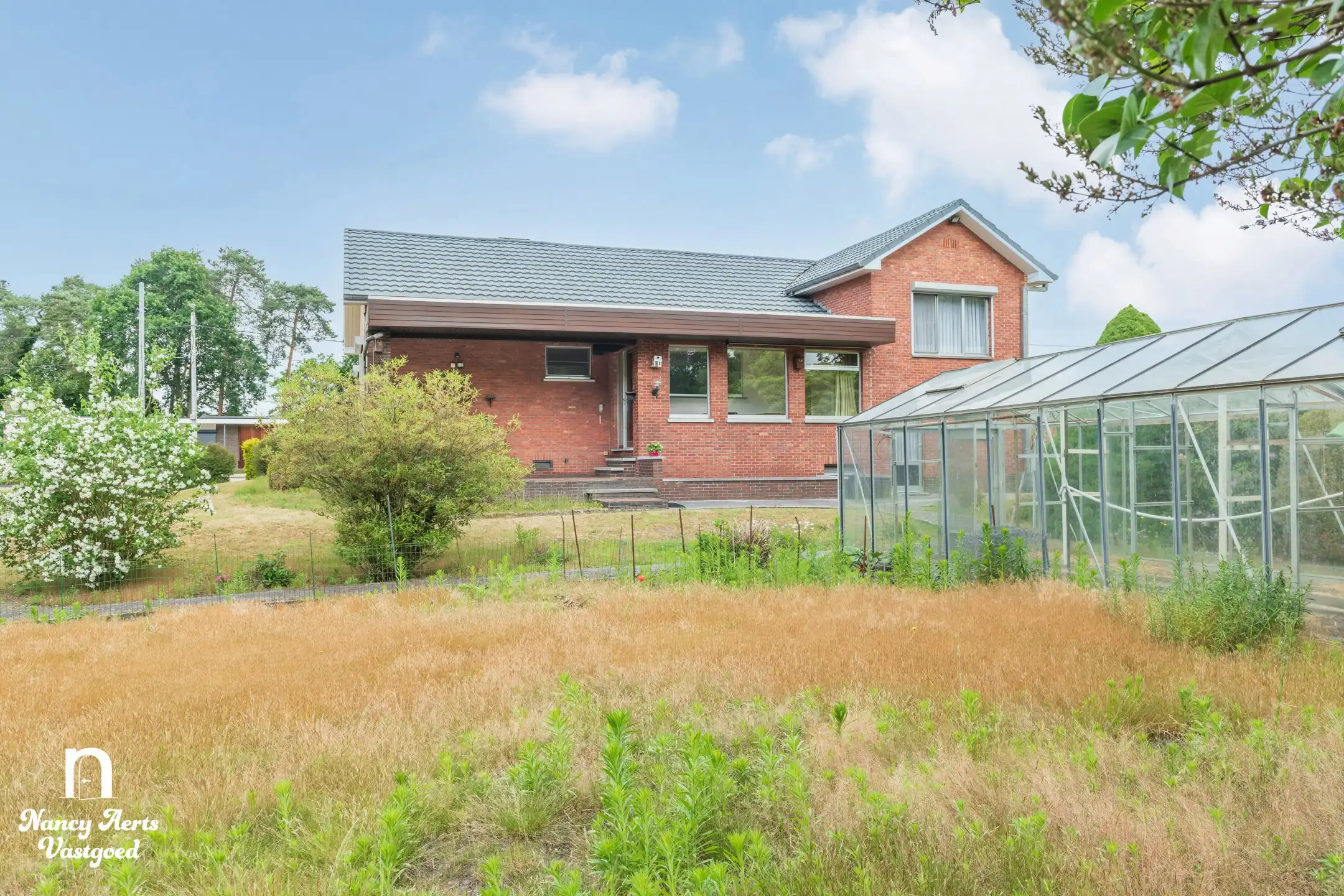 Uitstekend onderhouden split‑level woning in groene omgeving foto 26