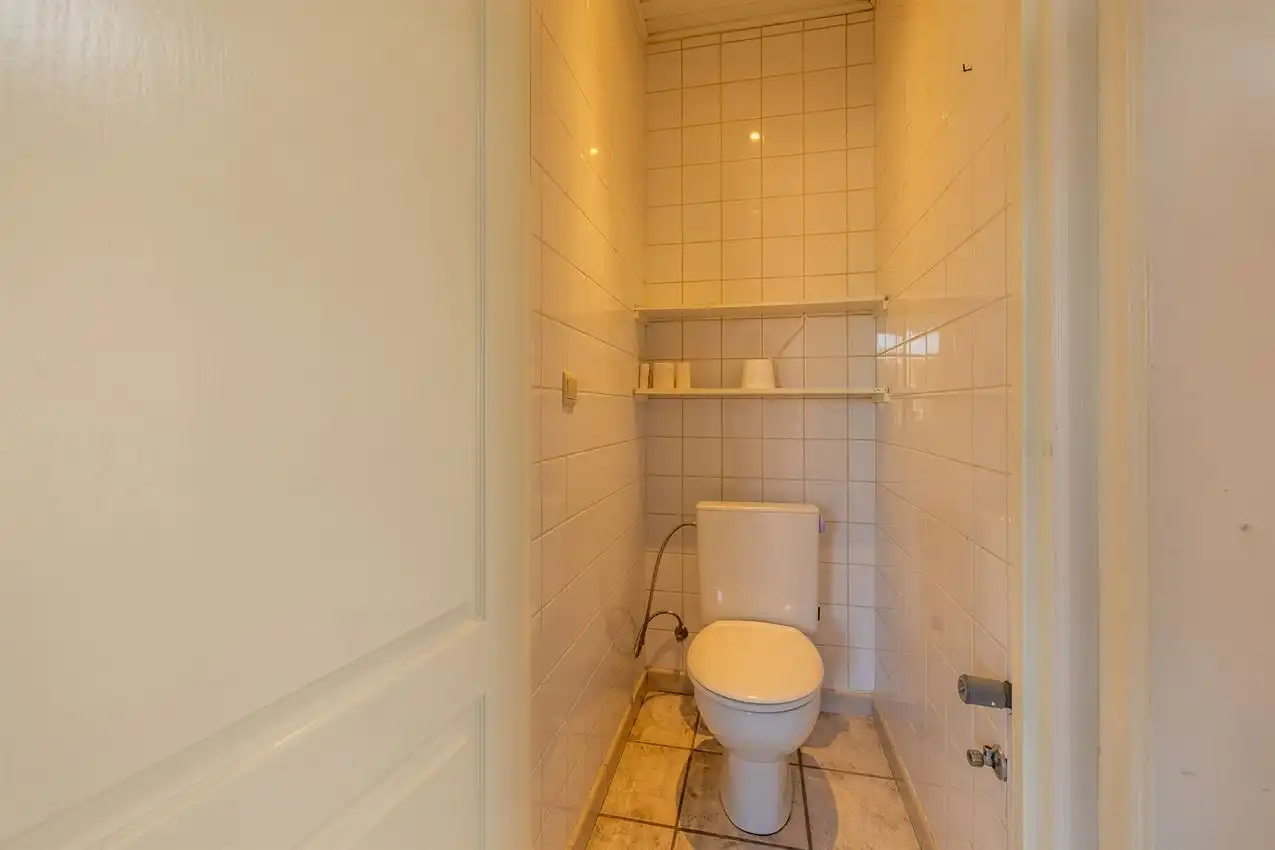 Verzorgde woning met 2 slpk., tuin en garage foto 11