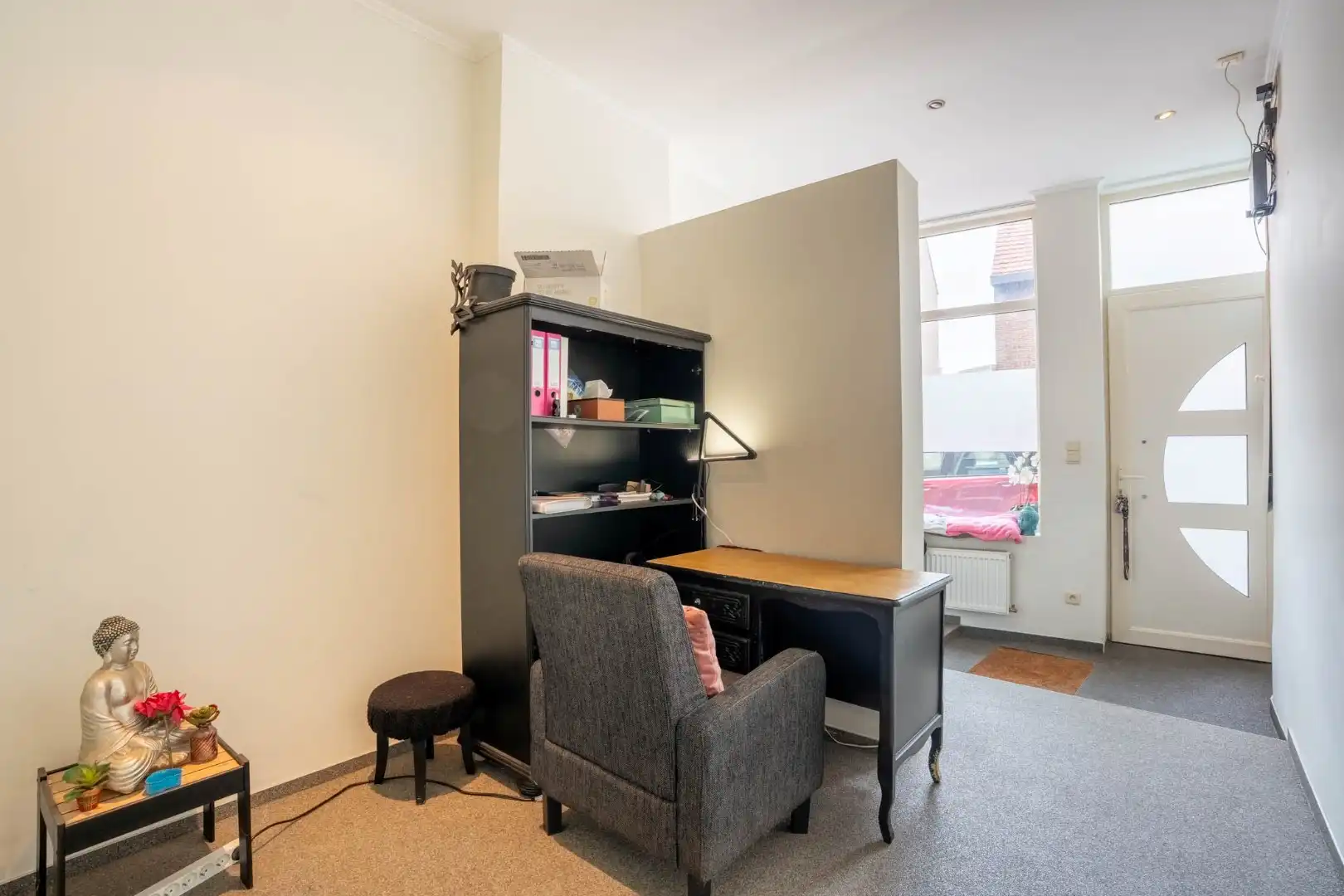 Een knusse rijwoning met tuintje en 3 slaapkamers, gelegen pal in het centrum van Maaseik. foto 5