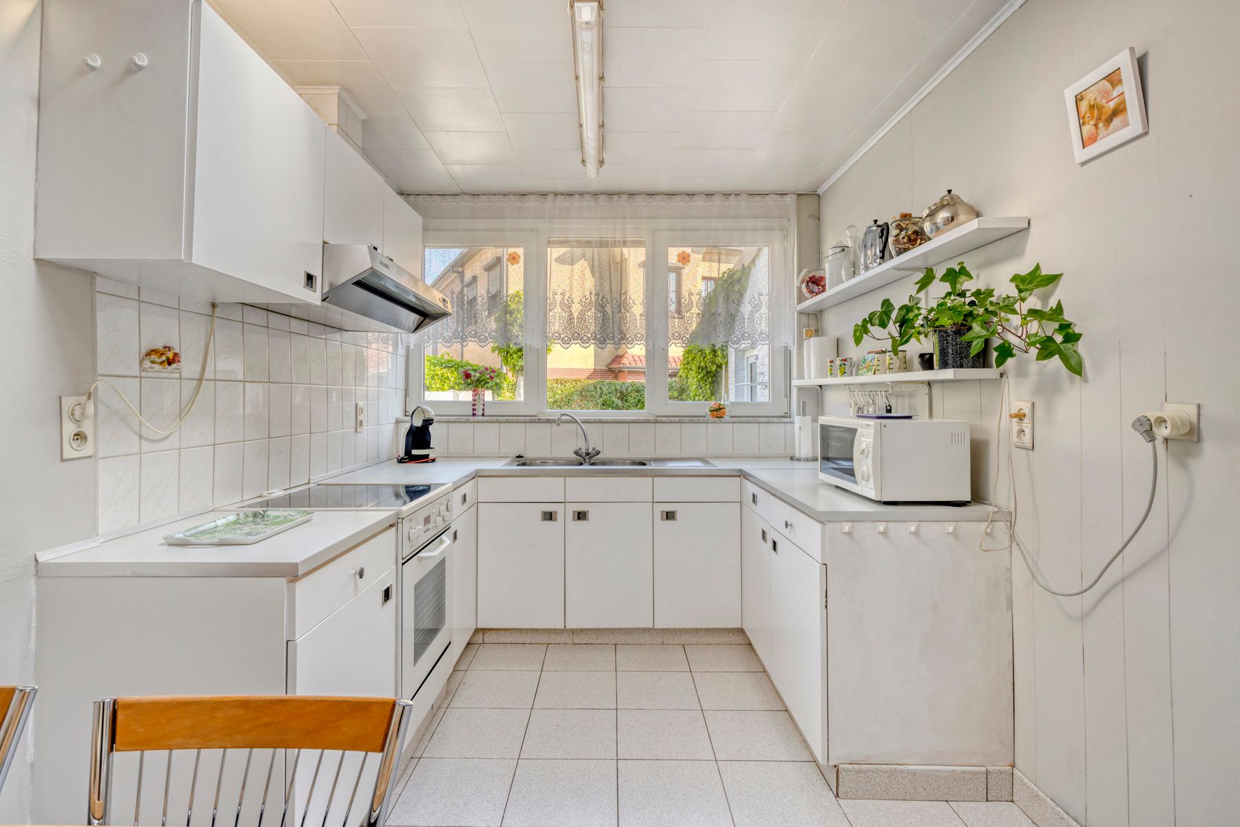 Te renoveren rustig gelegen woning met 4 slaapkamers foto 9