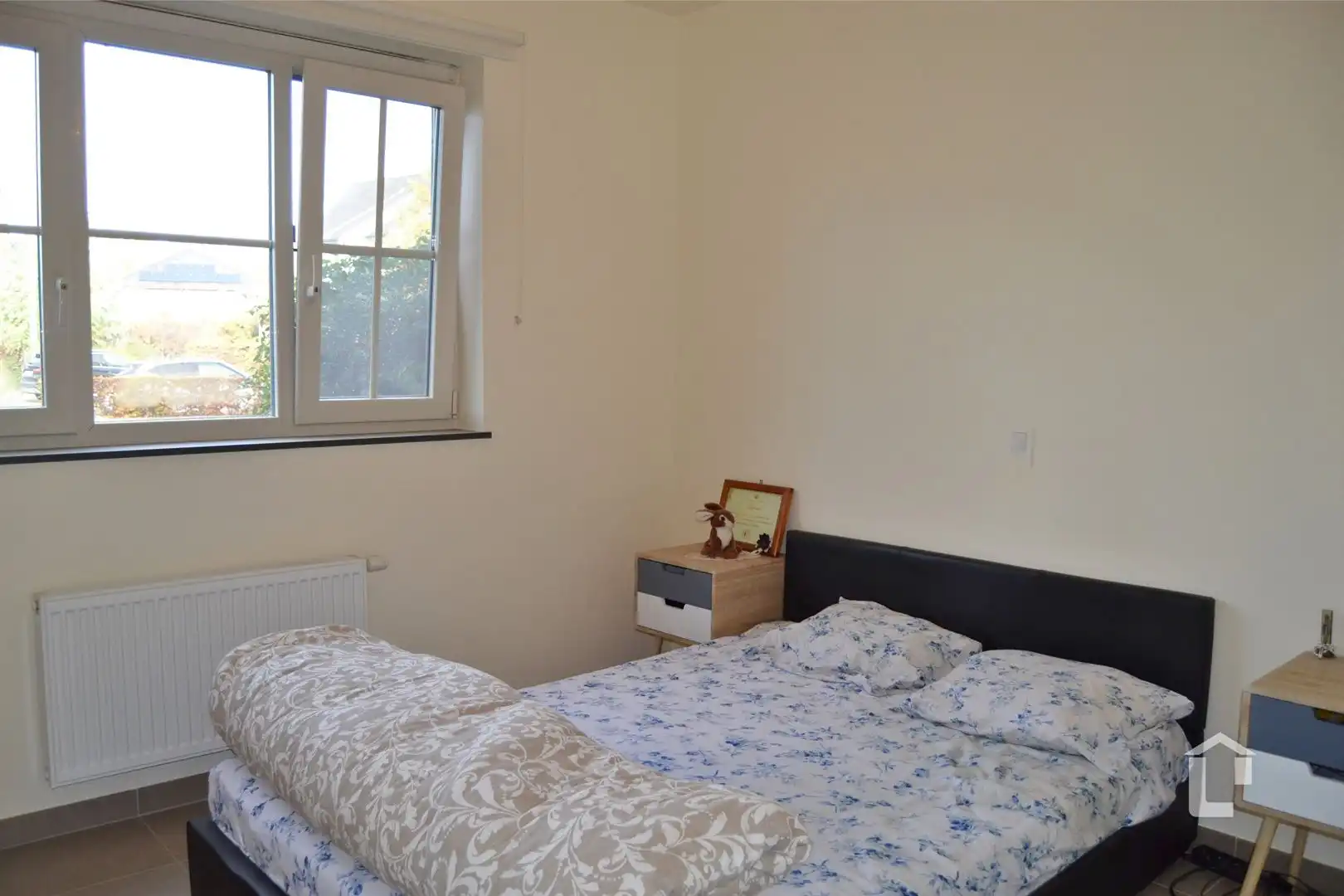 Recent, instapklaar gelijkvloersappartement met groen uitzicht foto 6