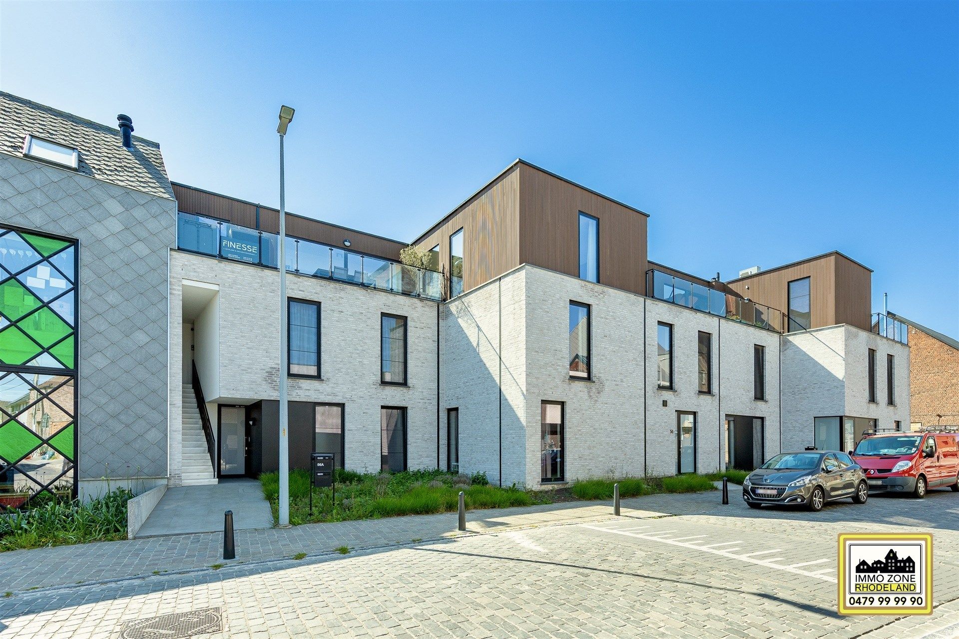 Lichtrijk appt met 2 slpks, 3 terrassen, garage, staanplaats foto 2