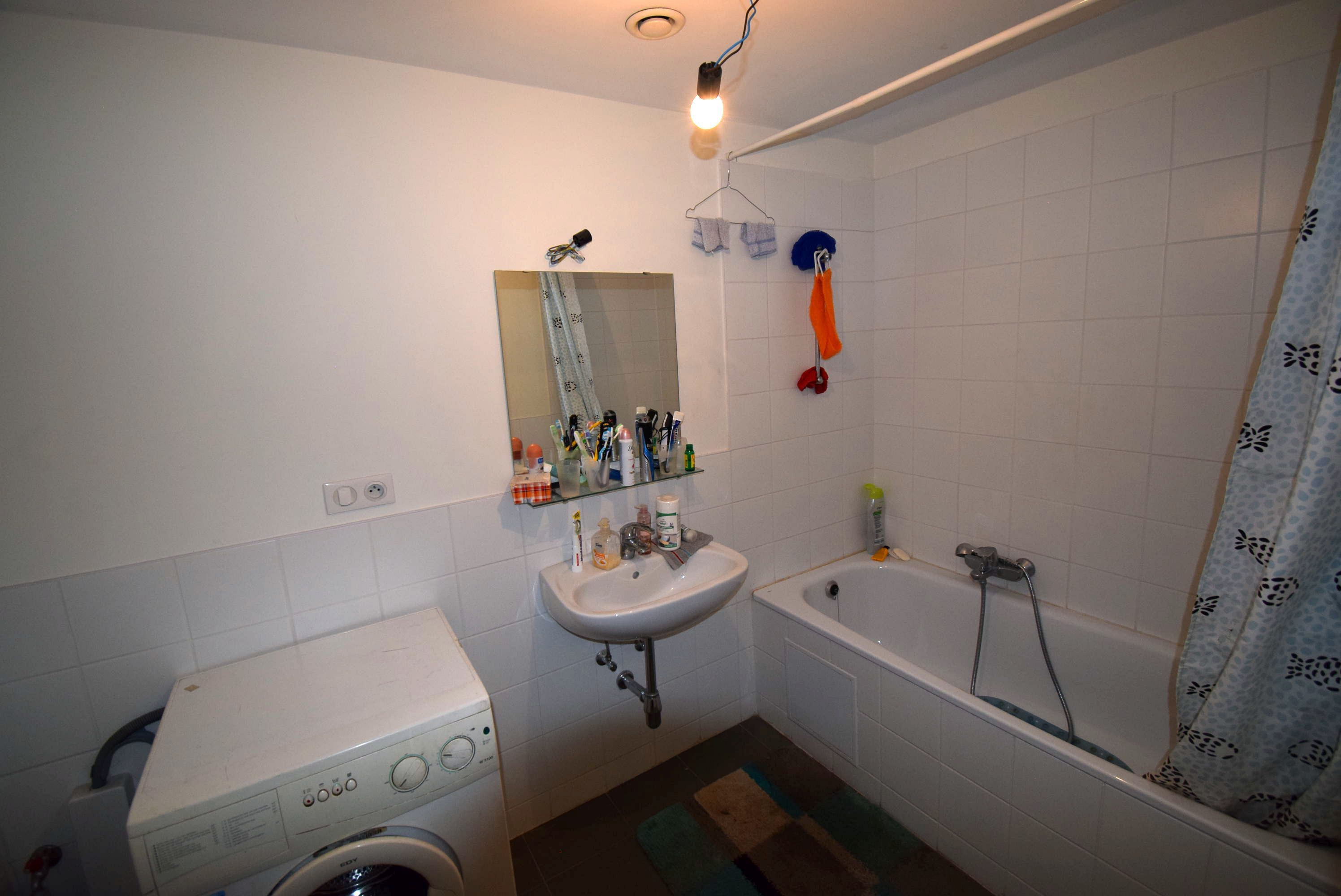 Gelijkvloers appartement 4 slaapkamers met tuin en autostaanplaats foto 11