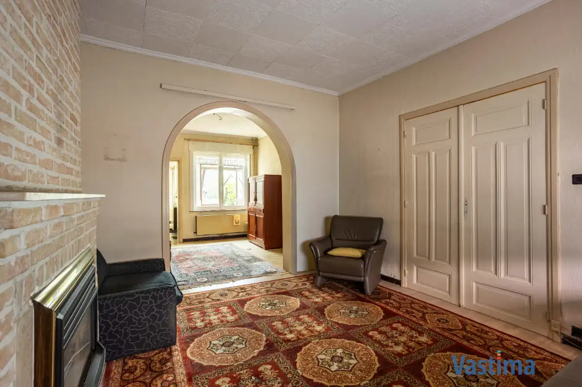 Te renoveren woning met tuin nabij OLV-Ziekenhuis foto 4