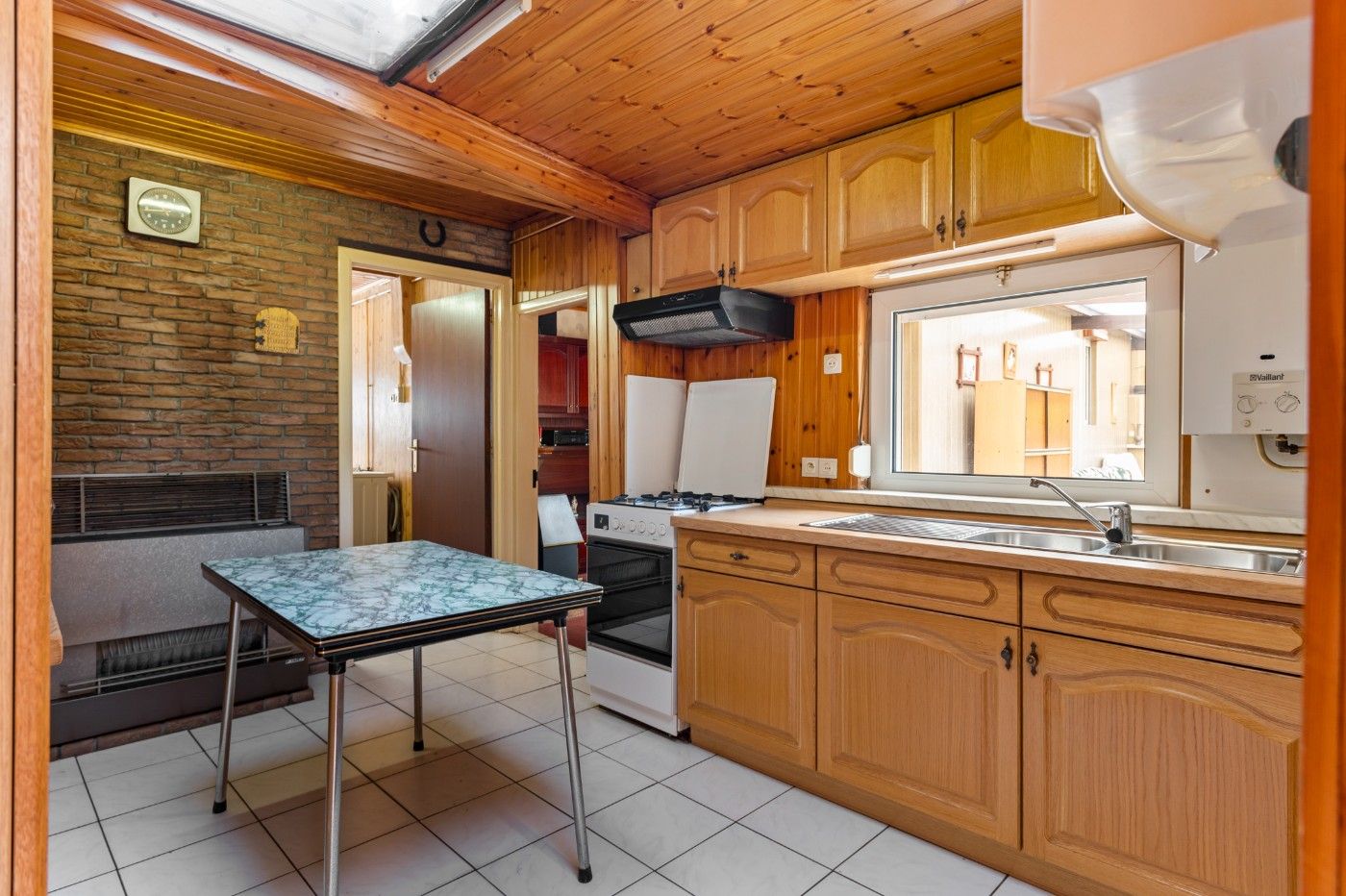 Tof gelegen, te renoveren woning met 2 slpk., garage en tuin foto 5