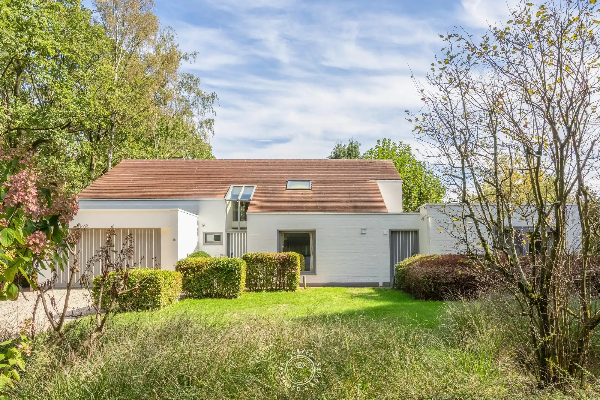 Residentiële villa op een uitzonderlijk groen perceel van meer dan 2.000 m² in de gegeerde Eikenlaan te Belsele foto 3