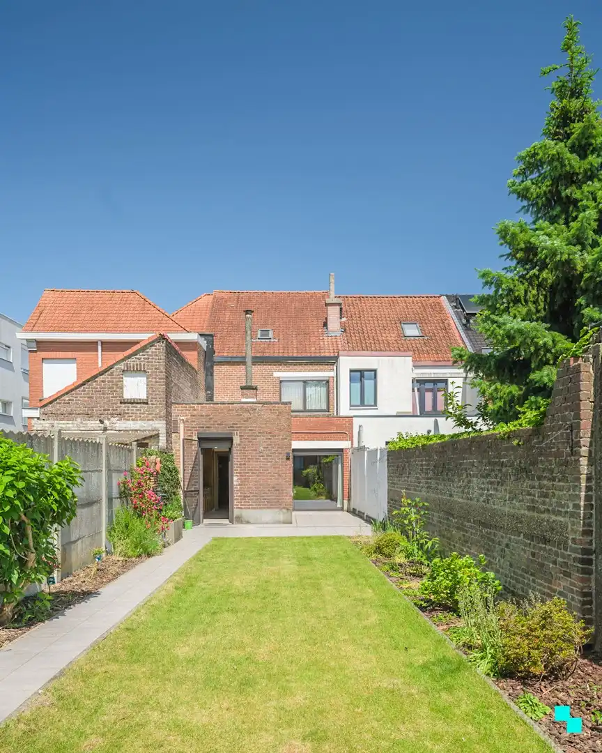 Strategisch gelegen woning met zonnige tuin en werkhuis foto 27