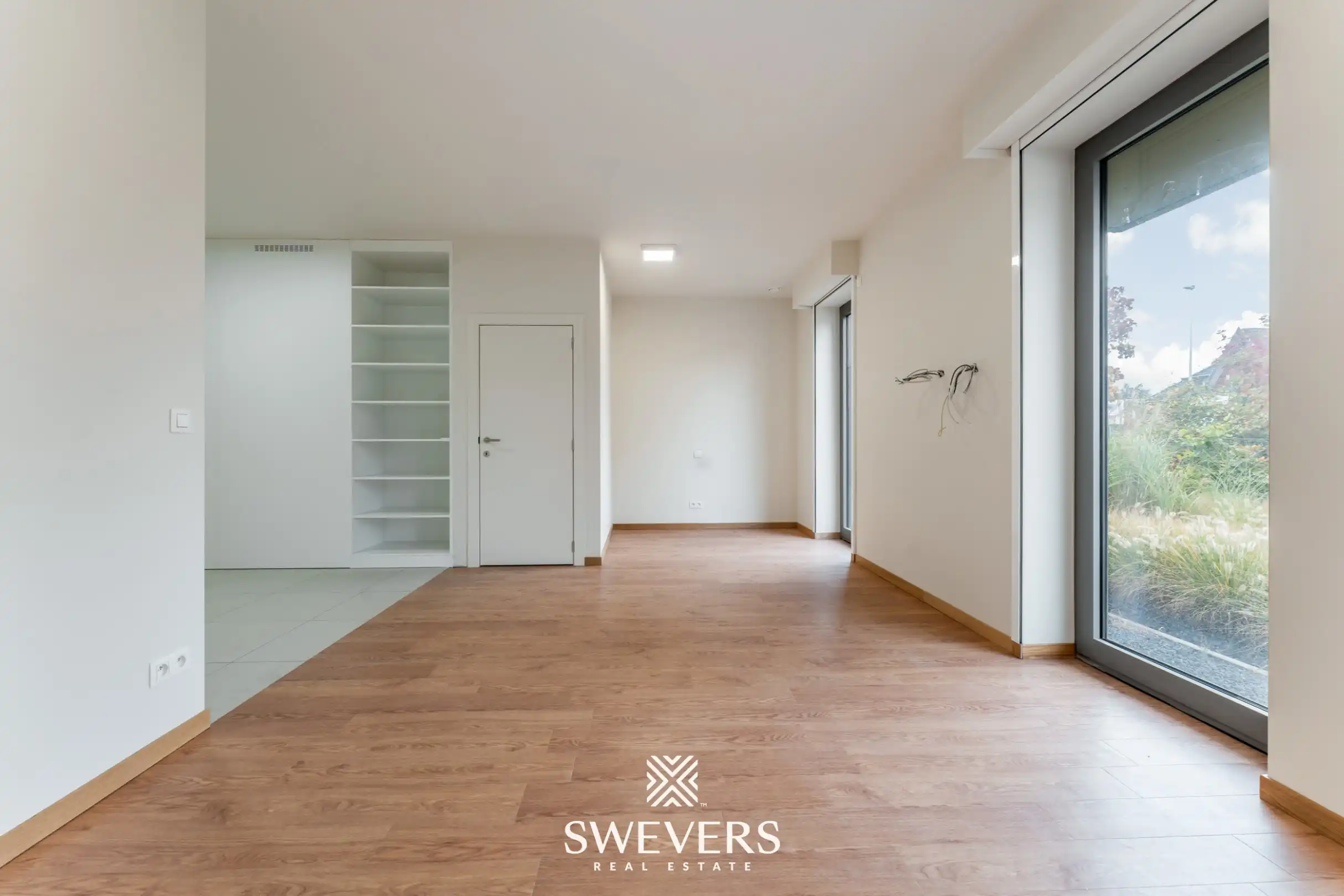 Stijlvol, gelijkvloers en instapklaar appartement (208 m²) mét private tuin en private kelder vlakbij Zolder-centrum foto 22