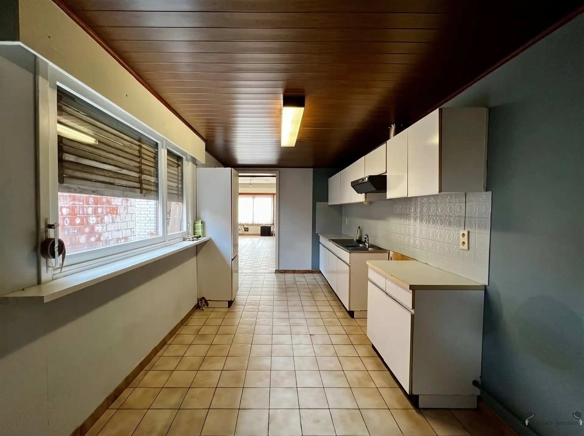 Te renoveren rijwoning met tuin foto 3