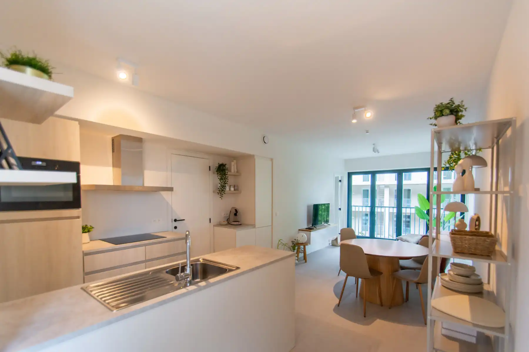 Lichtrijk gemeubeld nieuwbouwappartement met 2k en terras foto 4