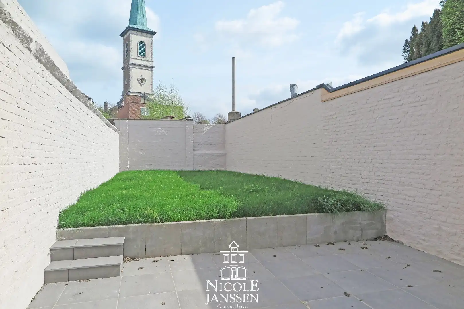 Mooi, gelijkvloers appartement met terras en tuin foto 3