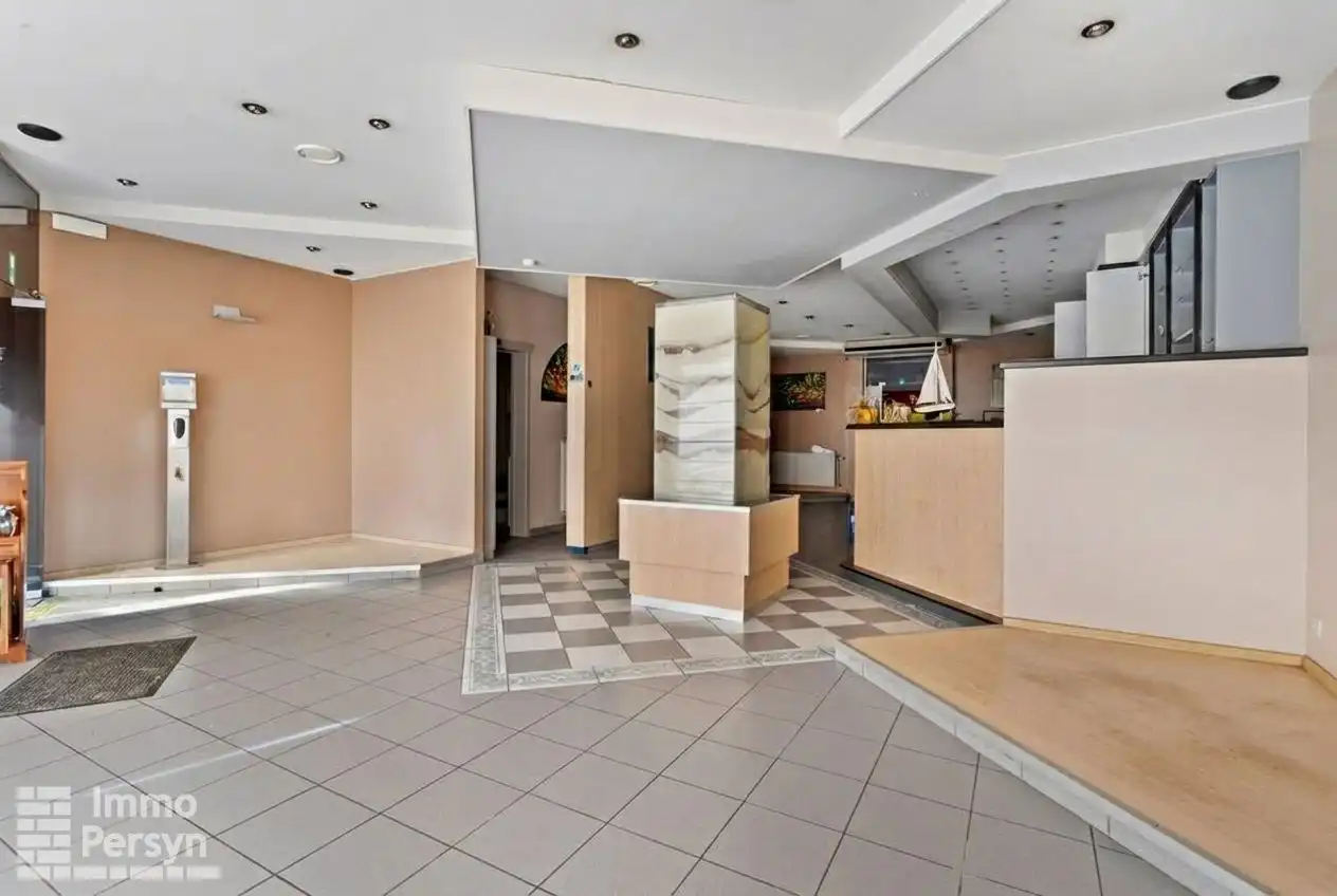 Veelzijdig handelspand met bovenliggende woonst en studio op centrale ligging in Begijnendijk foto 4
