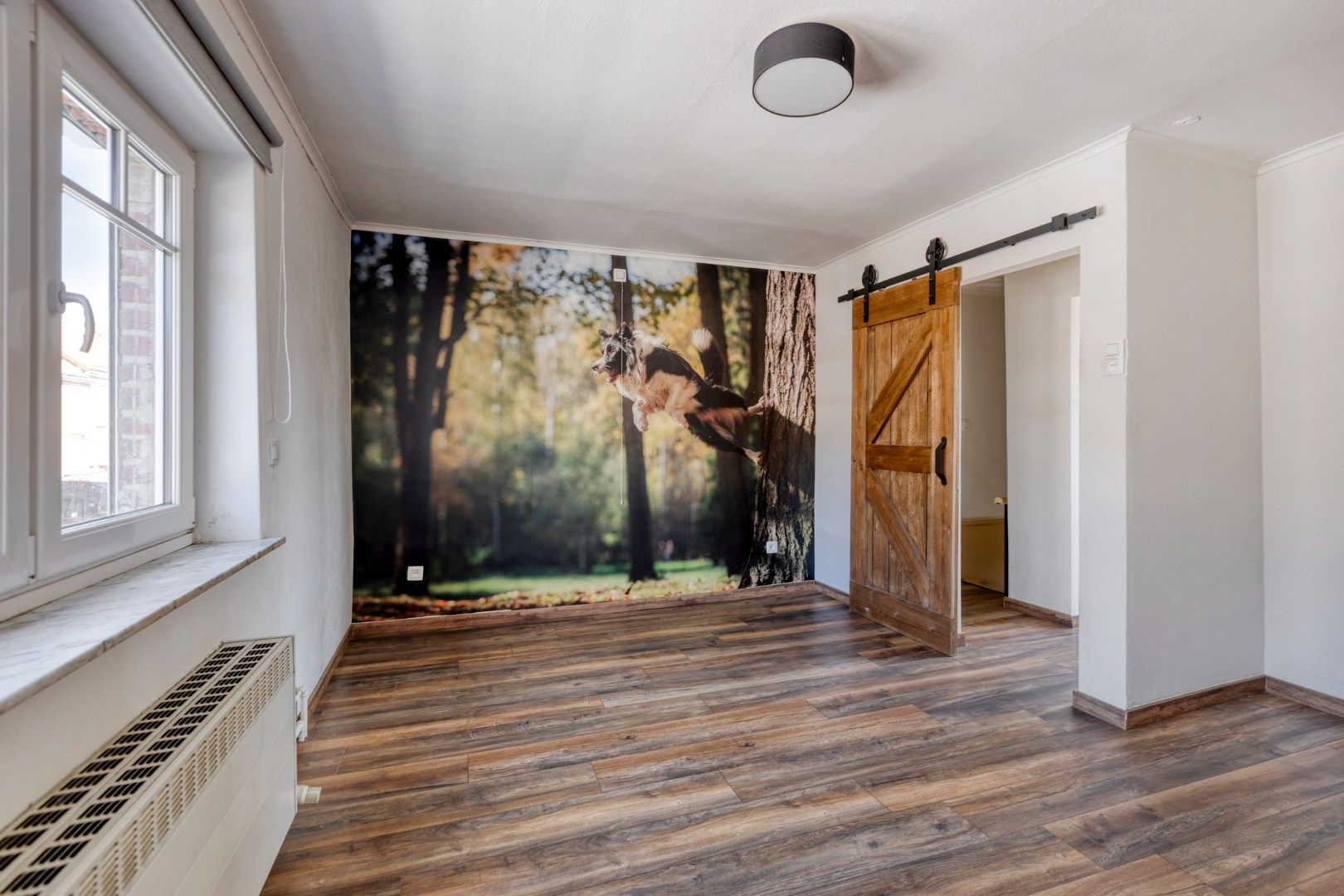 Gezellig ingerichte woning met hobbyruimte en tuin + toegang achterom foto 13