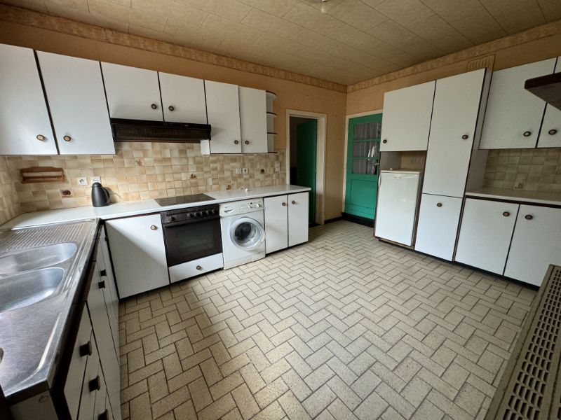 Te renoveren langgevelwoning met veel potentieel op ruim perceel in Herselt foto 12