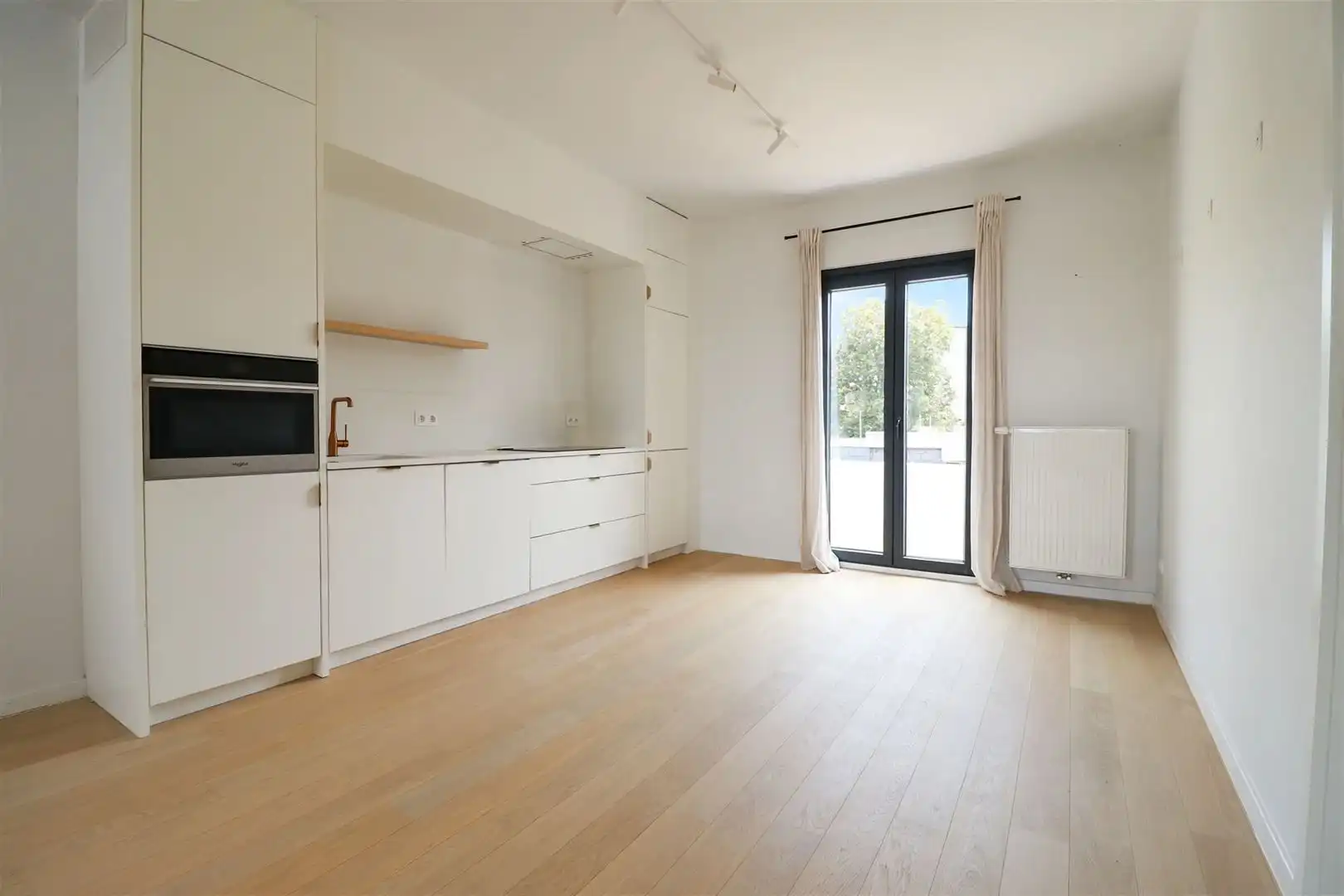  Lichtrijk 1-slaapkamerappartement met ruim terras foto 2