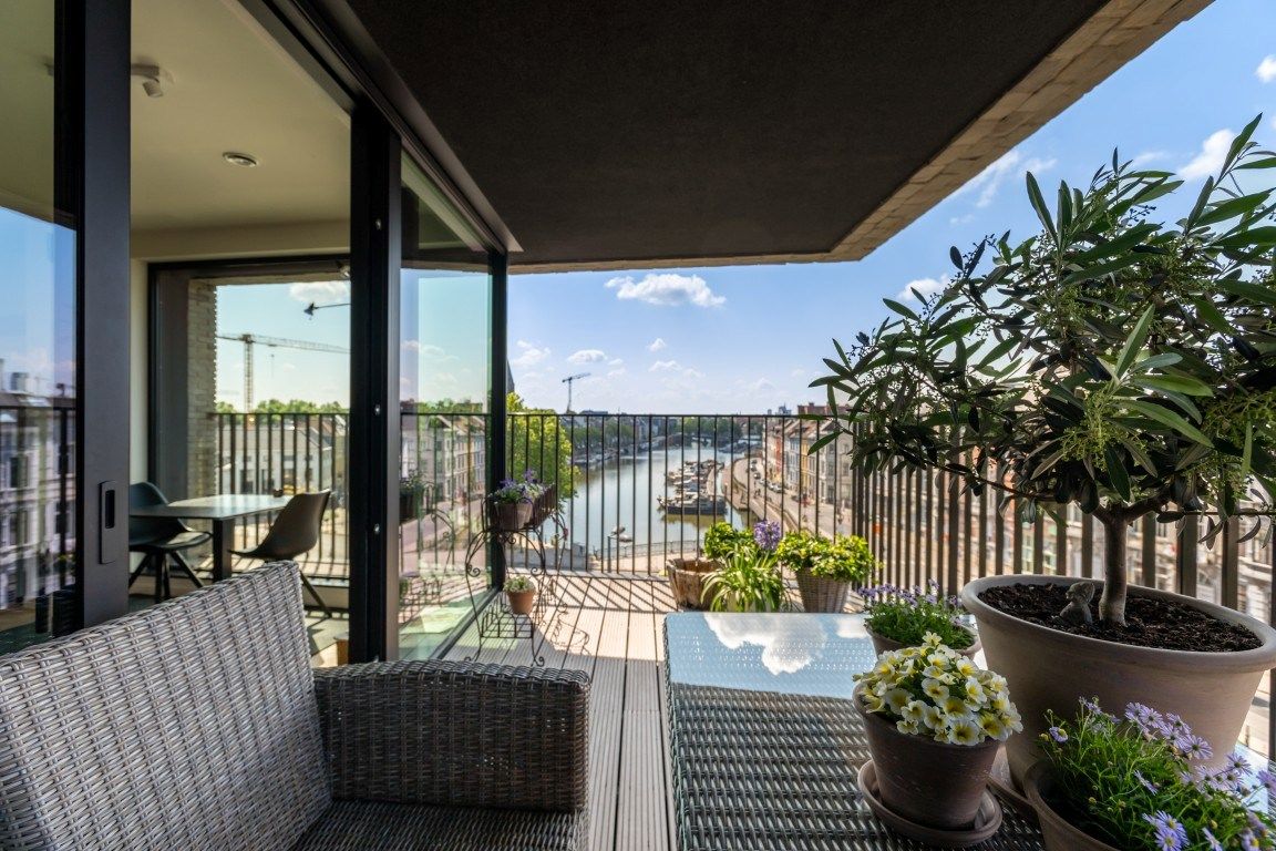 Mooi gelegen appartement langsheen het water met terrassen en parkeerplaats te Gent foto 3