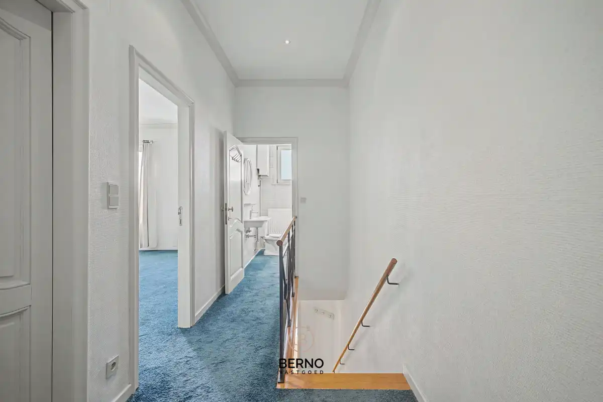 Rijwoning met ruime garage en zongerichte tuin. foto 10