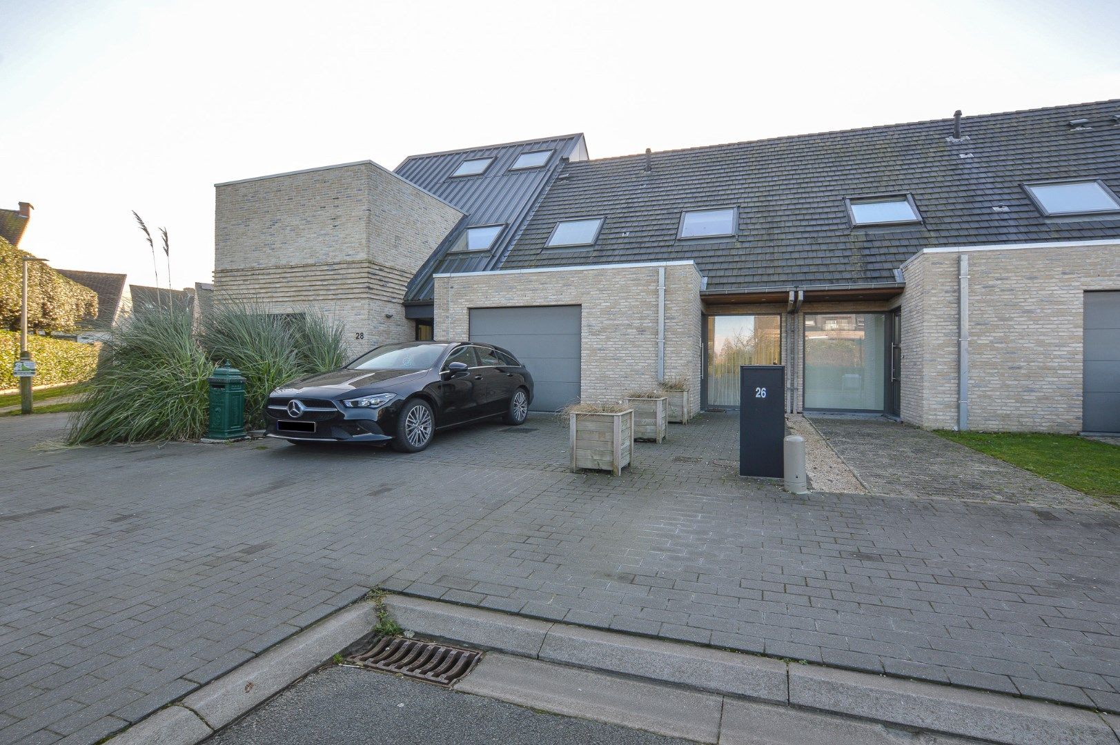 Nieuwbouwwoning met 3 slaapkamers en garage te huur in Bredene dorp foto {{pictureIndex}}