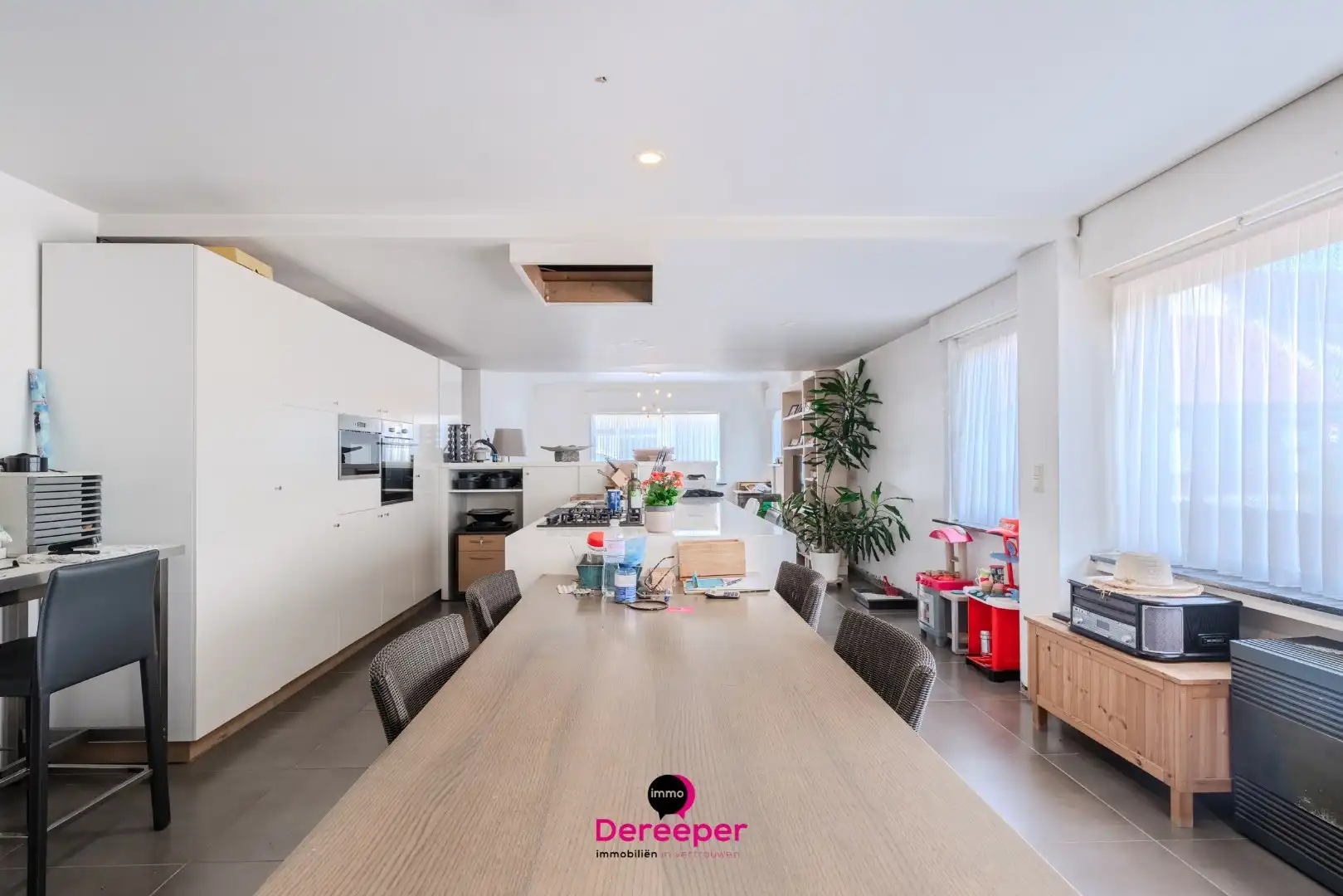Te renoveren halfopen woning met zuidgerichte tuin op 571 m² in Jabbeke foto 2