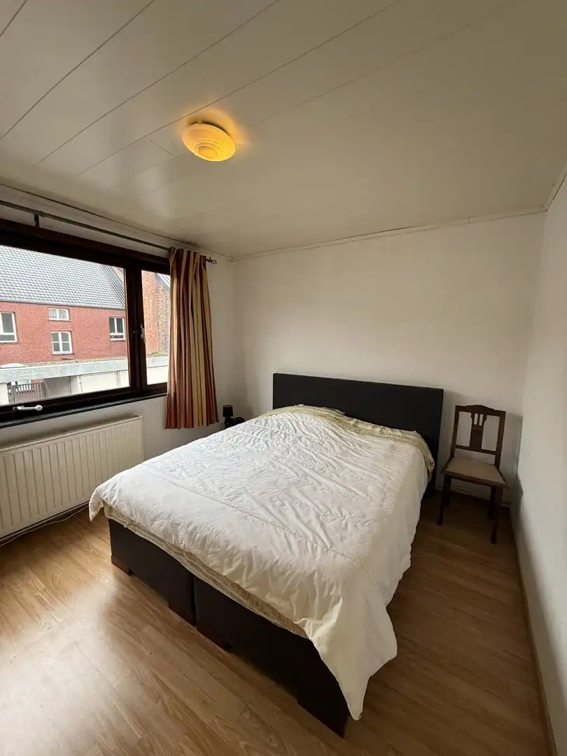 Opbrengsteigendom bestaande uit 2 halfopen woningen met garage en tuin te Hechtel. foto 13