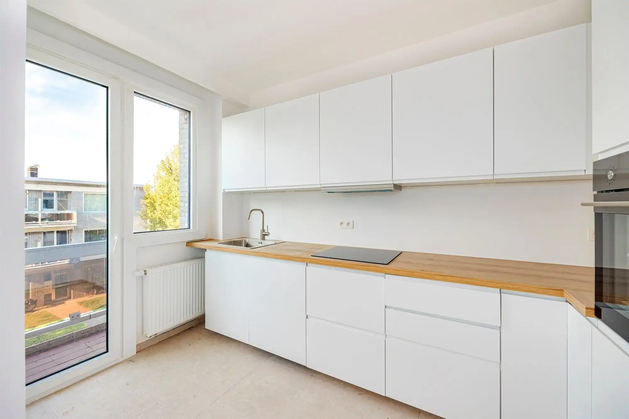 Instapklaar 2 slk appartement met terras te Mortsel foto 3