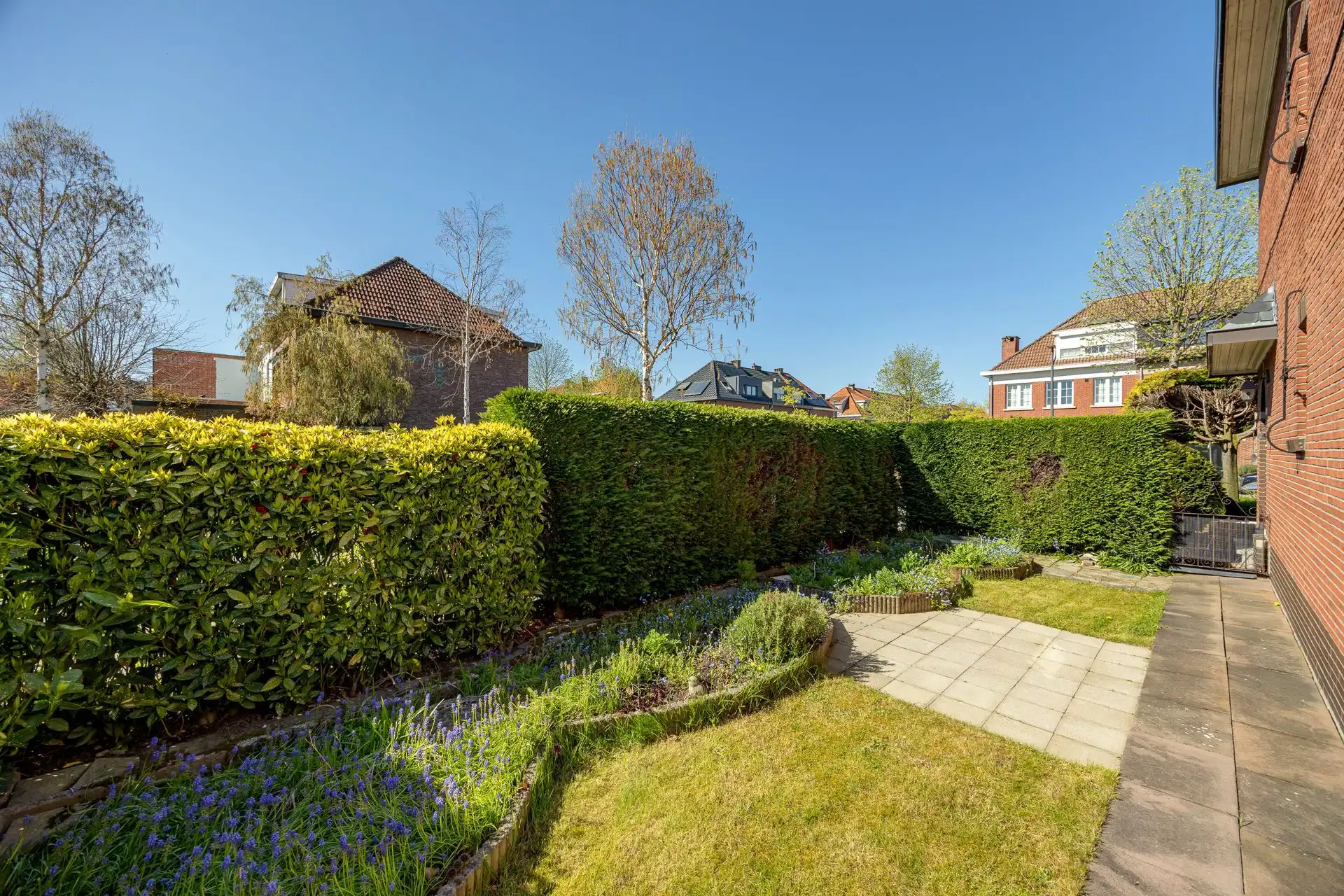 Ruime halfopen bebouwing met 5 slaapkamers, garage en zonnige tuin op toplocatie! foto 37