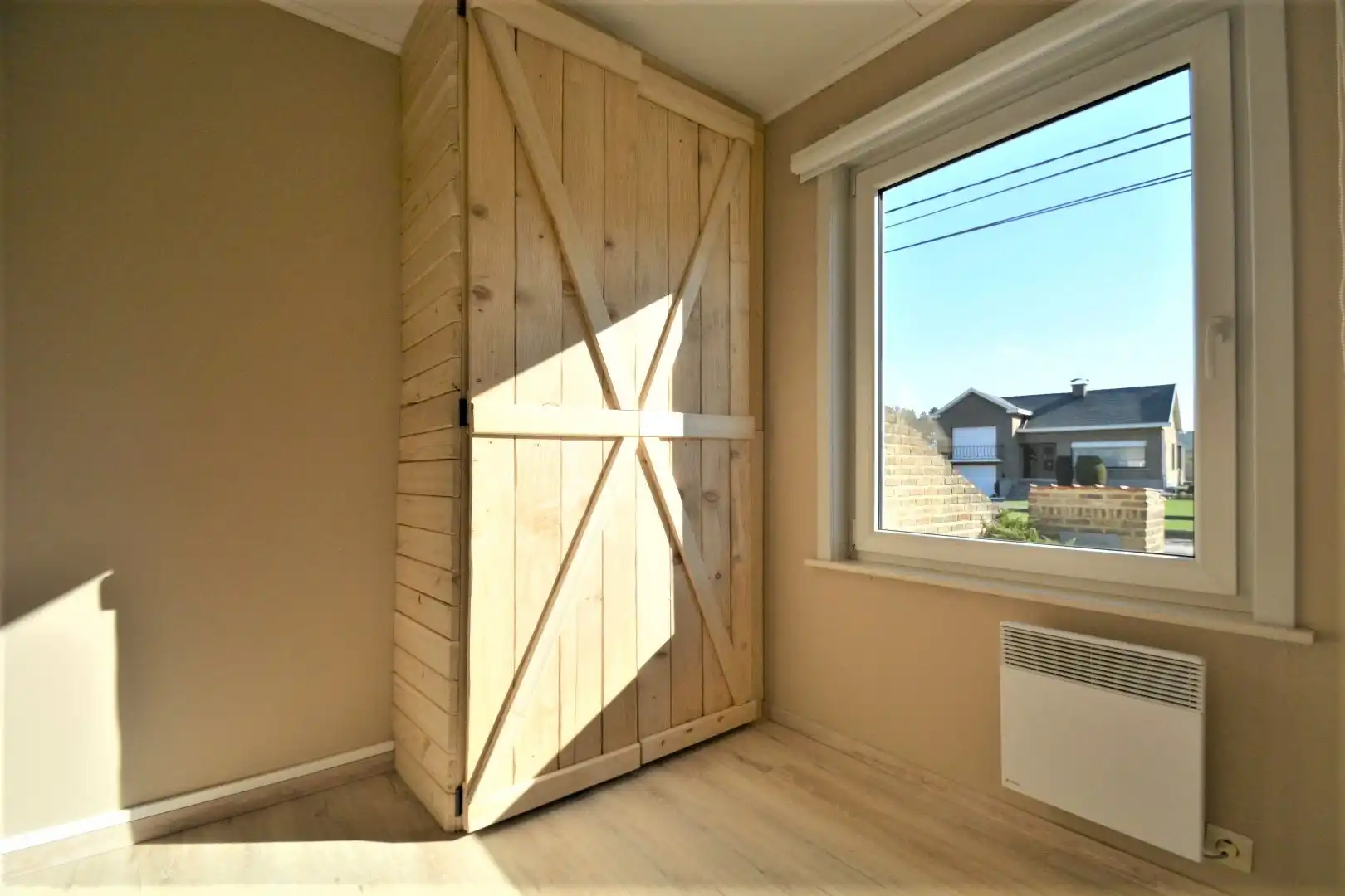 GELIJKVLOERSE WONING MET 1 SLPK TE TREMELO foto 8