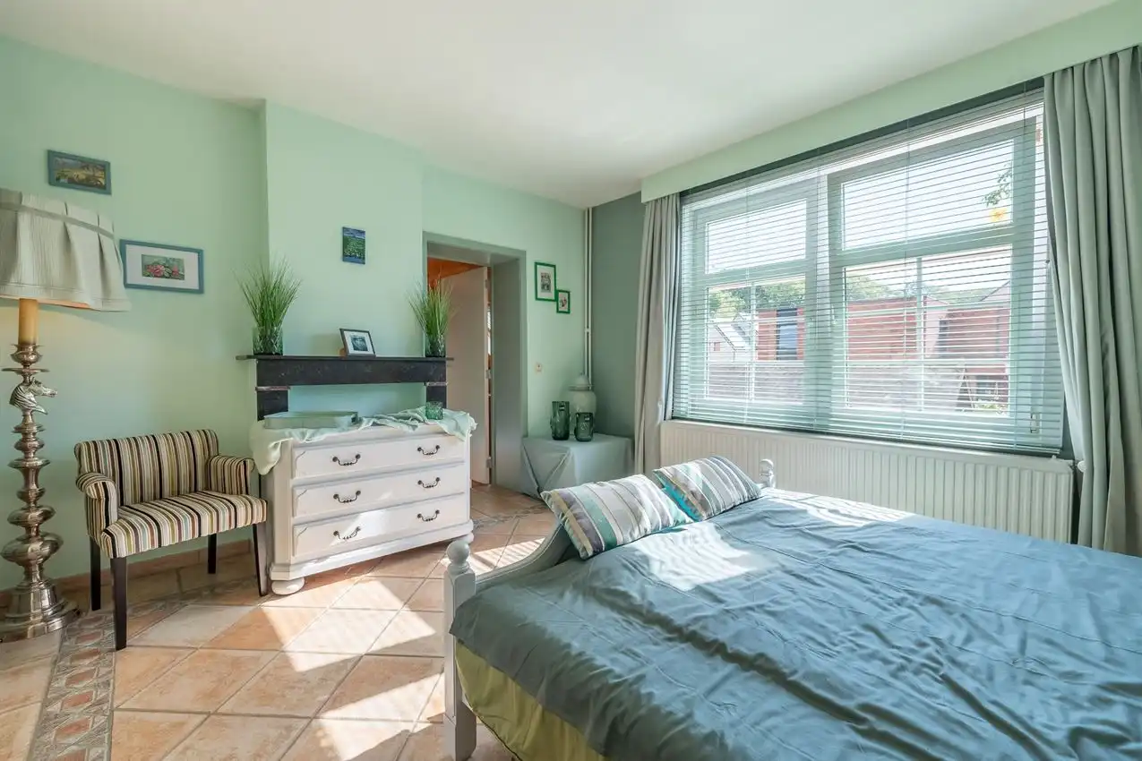 Karaktervolle en instapklare woning met zonnige tuin nabij het Gras- en Crauwelsbos foto 29