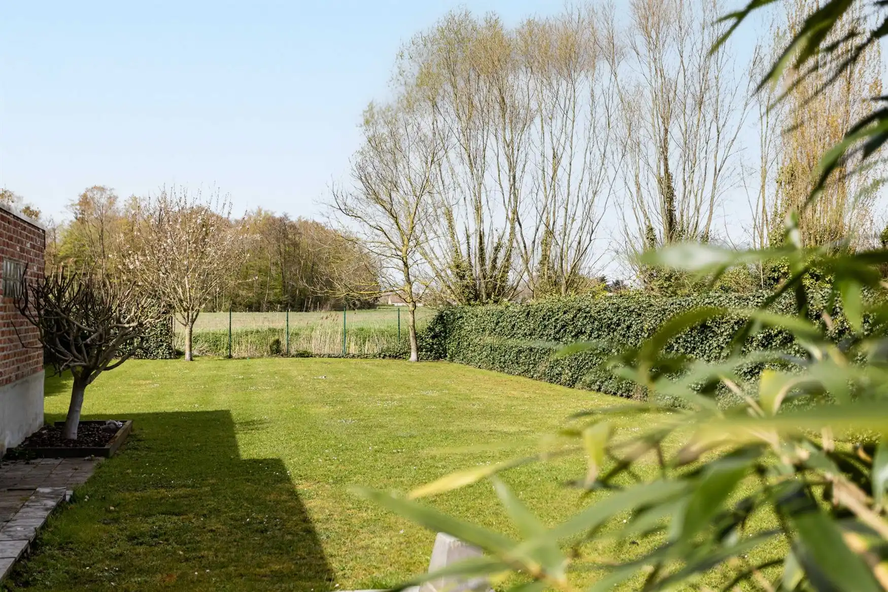Halfopen woning met zicht op Schipdonkkanaal en velden foto 20