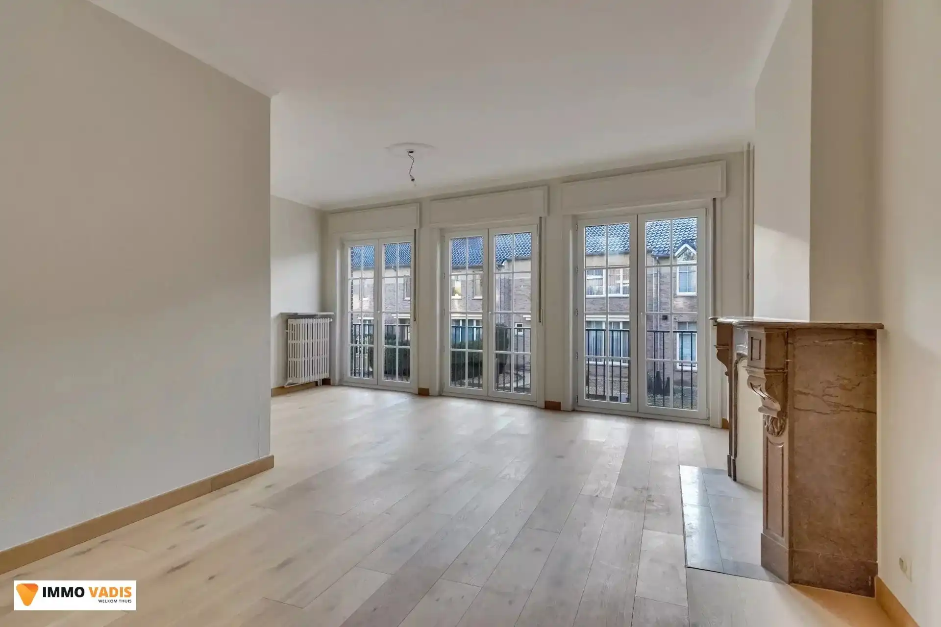 Karaktervolle herenwoning met vier slaapkamers, inpandige garage en tuin foto 4