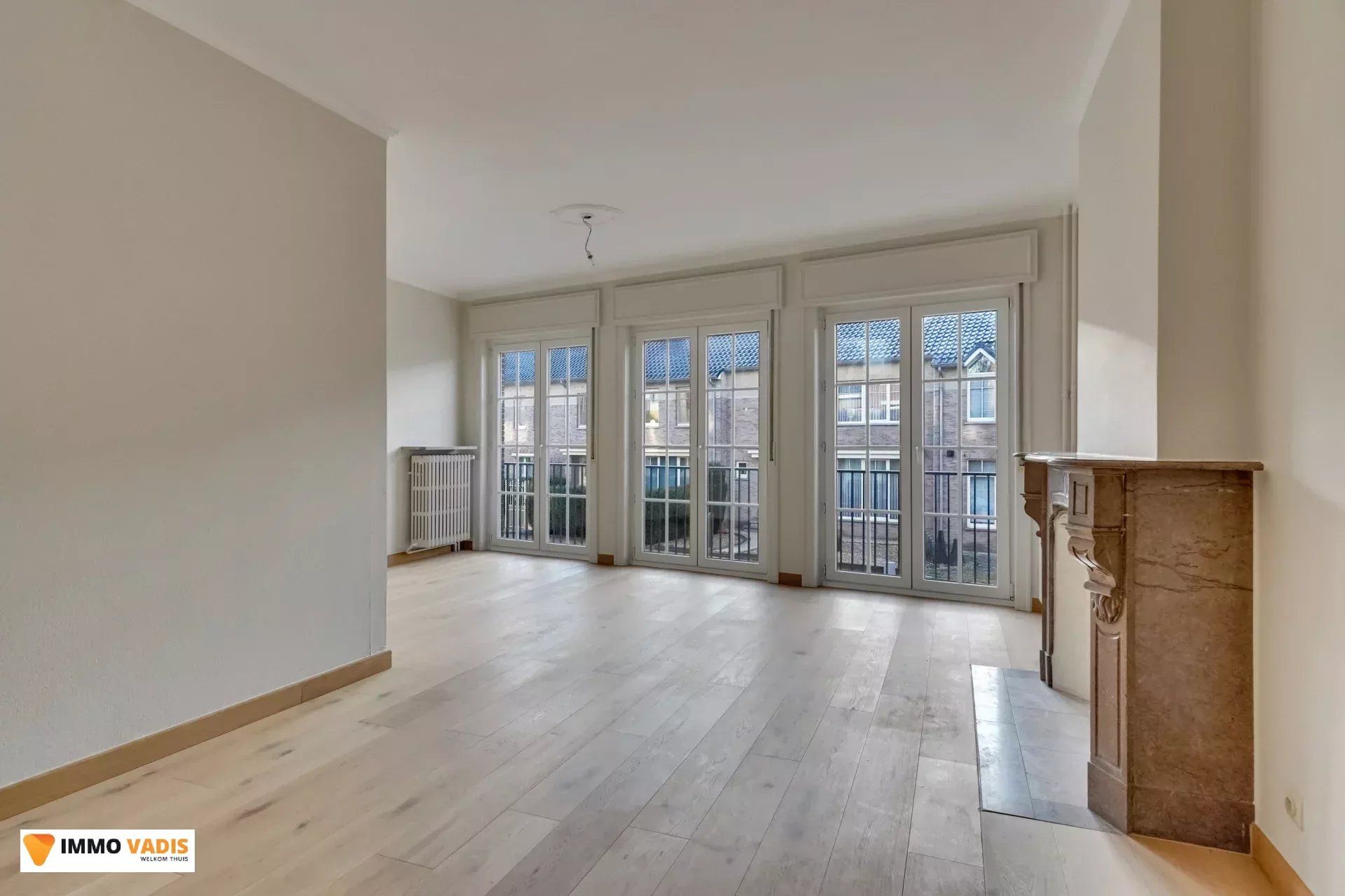 Karaktervolle herenwoning met vier slaapkamers, inpandige garage en tuin foto 4