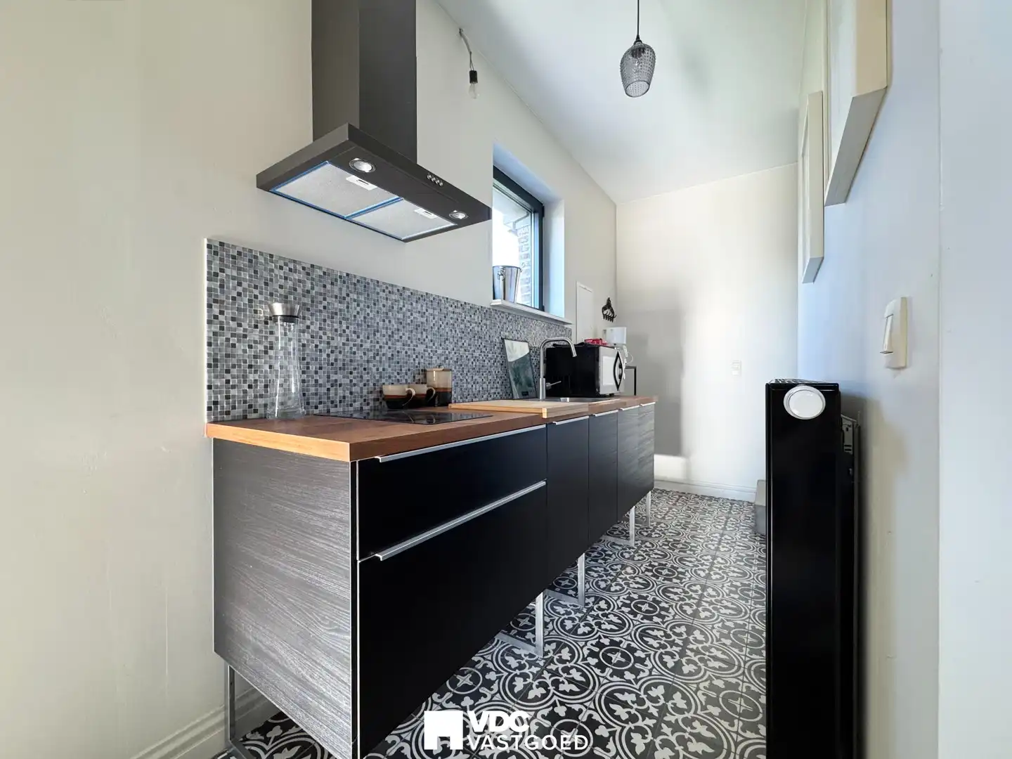 Charmante gerenoveerde woning met tuin in Klein-Gelmen (Heers) foto 14