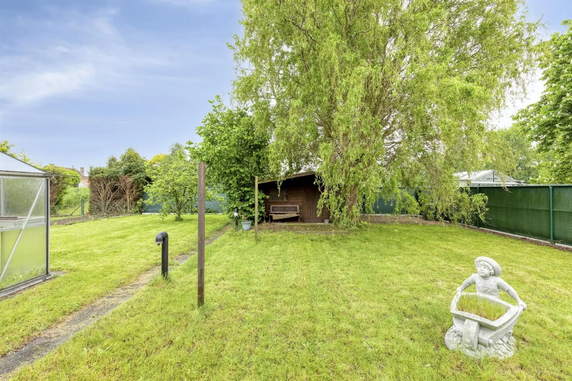 Laagbouwwoning met 2 slaapkamers, garage en tuin.  foto 20