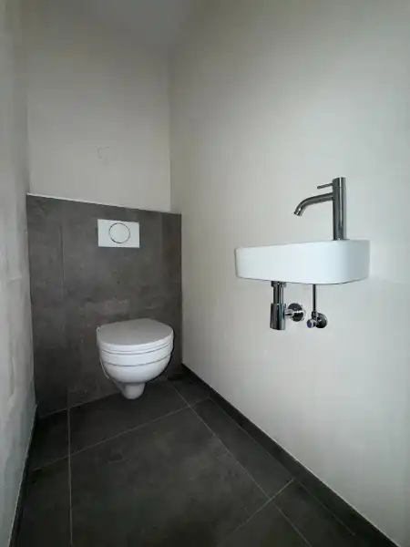 Prachtig BEN-penthouse met 1 slpk, terras, parking én zonnepanelen in het centrum van Houthalen foto 7