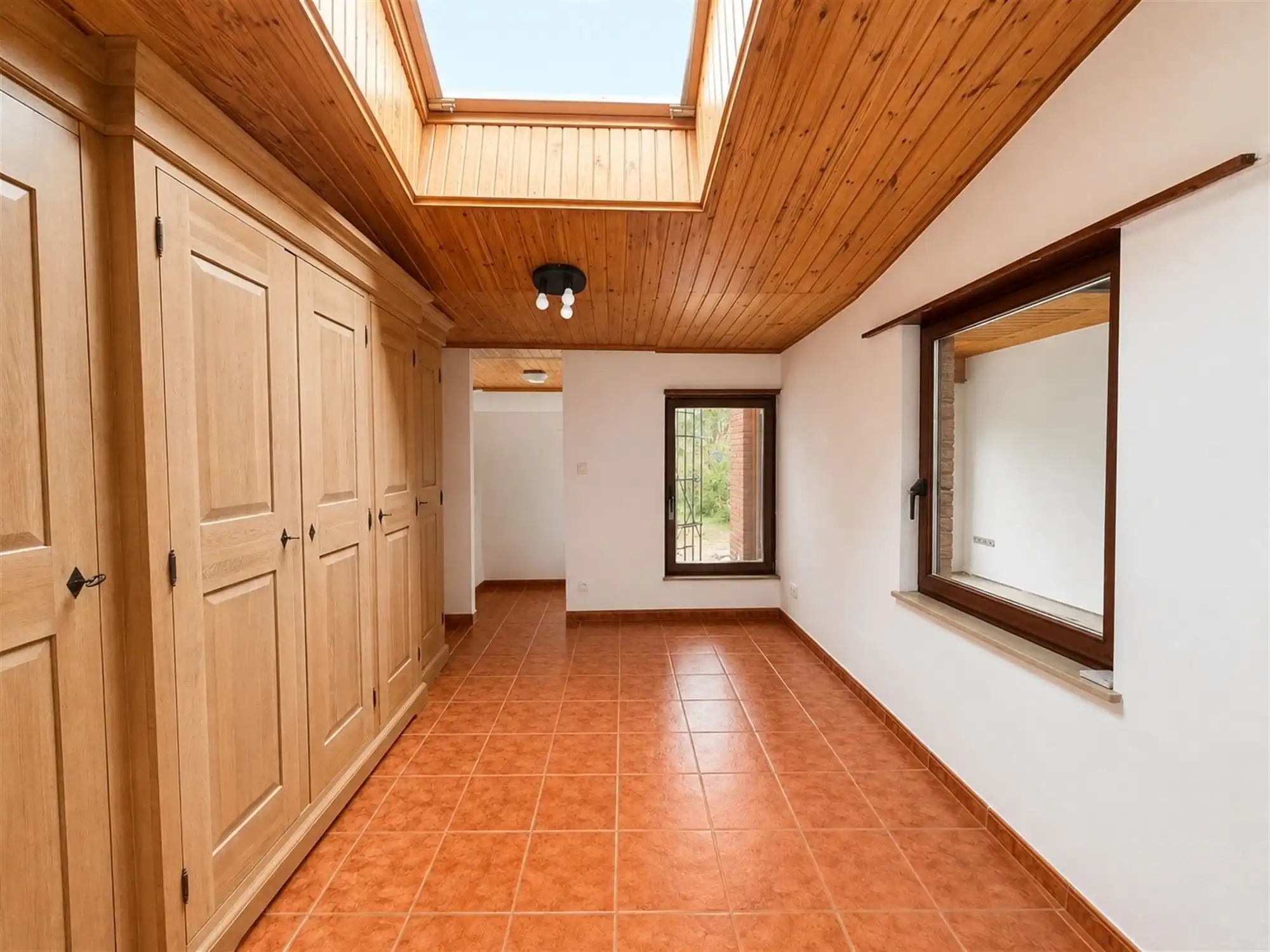 Gelijkvloers appartement met 400m² tuin foto 8