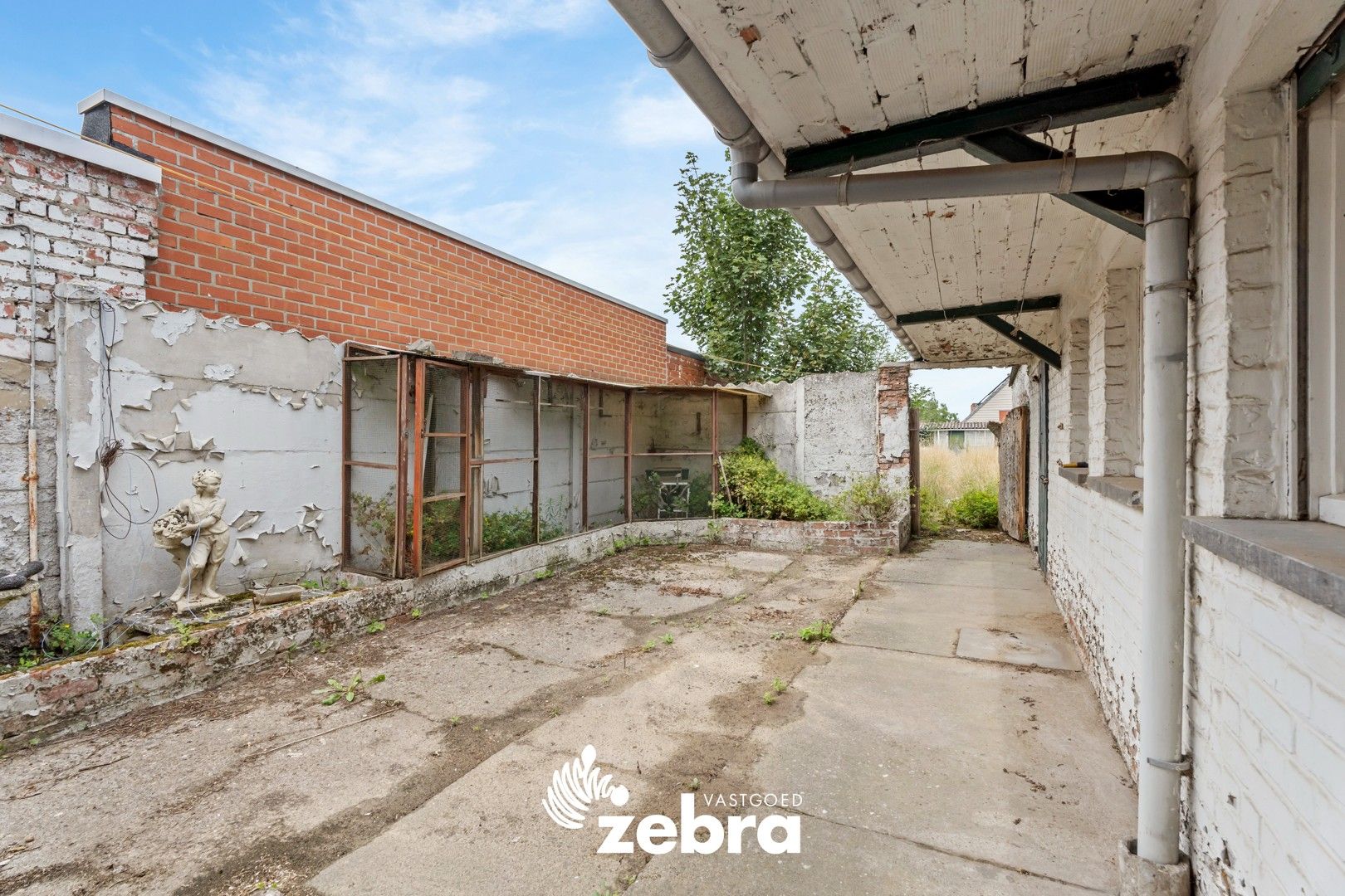 Te renoveren woning met 3 slaapkamers te Oostrozebeke! foto 18