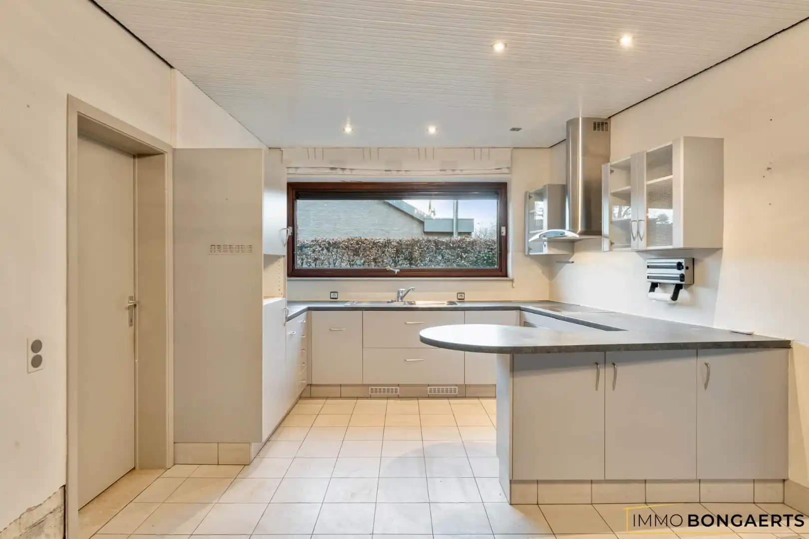 Gelijkvloerse woning met polyvalent bijgebouw foto 5