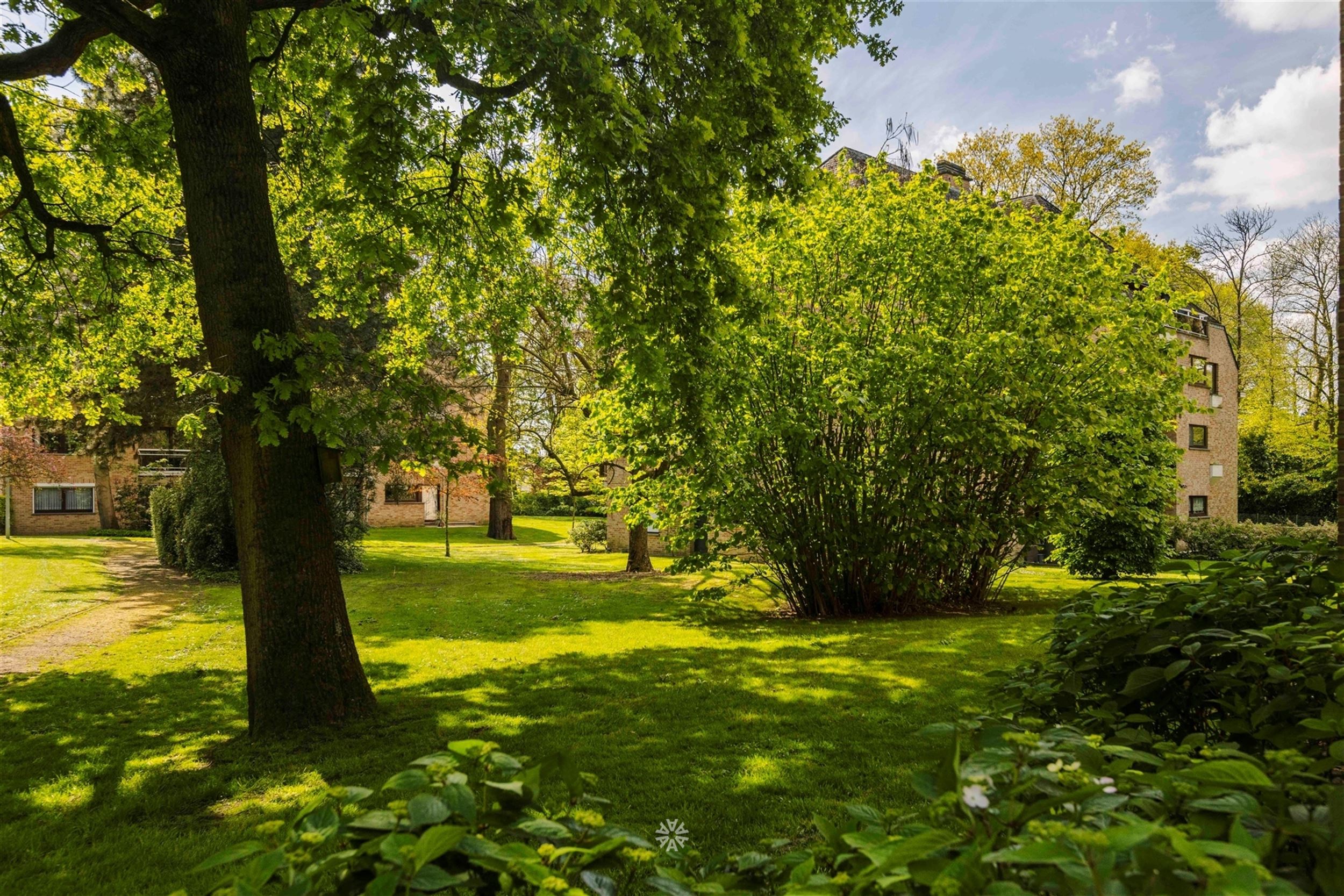 Gelijkvloers appartement met terras op exclusief domein te koop in Heusden foto 19