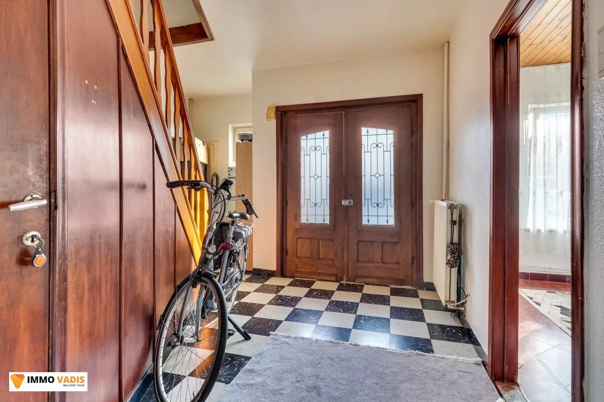 Handelspand met woonst en naastliggende woning foto 11