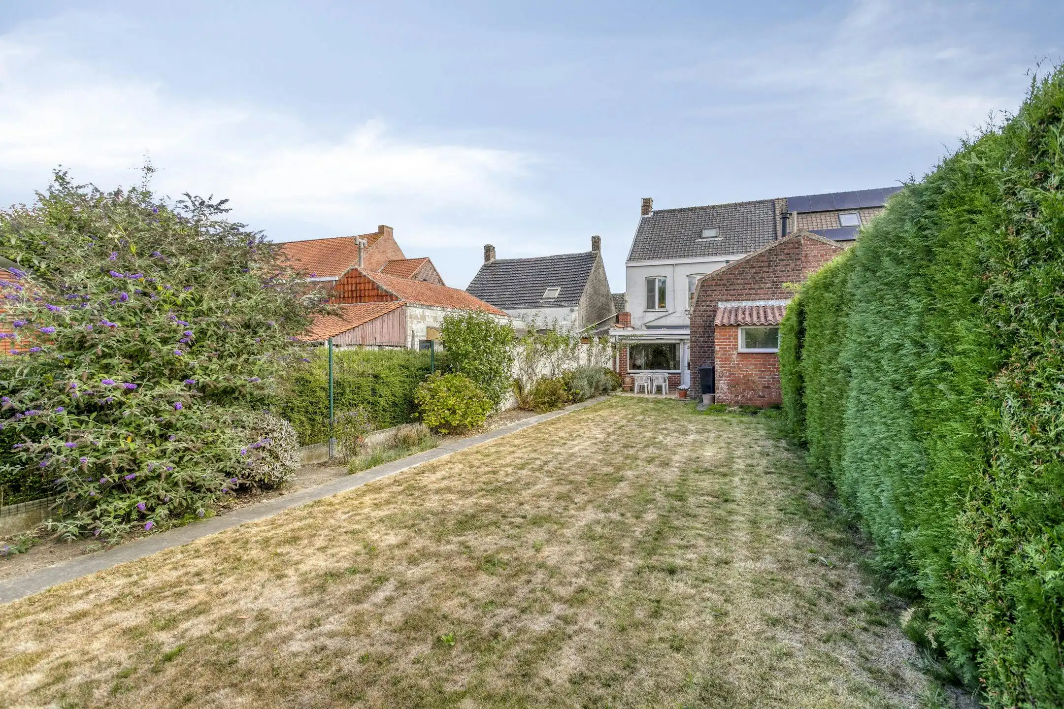 Karaktervol huis met zonnige tuin, 3 slaapkamers én garage met uitweg foto 5