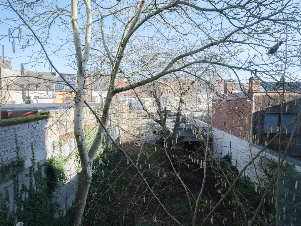 Een bijzondere woning die zich onderscheidt door haar architectuur, ruimtelijkheid en unieke tuin. foto 4